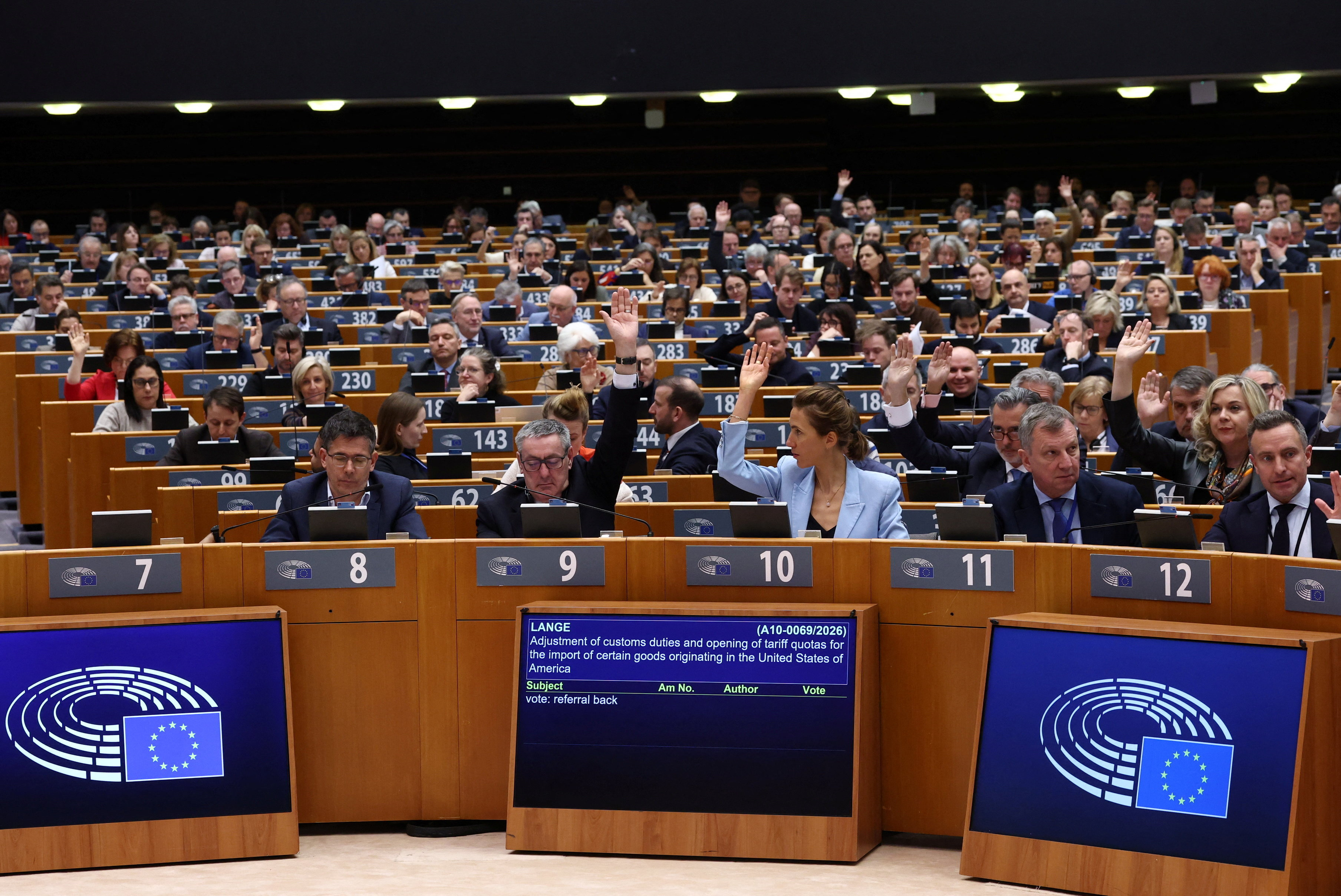 EU lawmakers advance US trade deal with multiple safeguards | Reuters