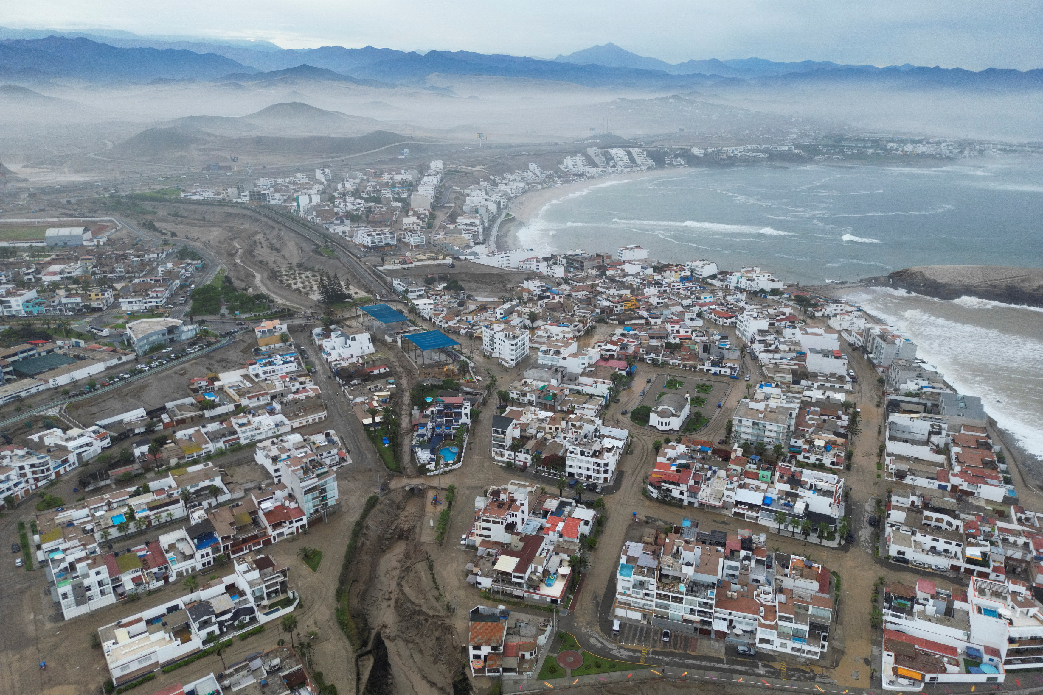 A landslide caused by Cyclone Yaku covers the streets of the Punta Hermosa resort, on the outskirts of Lima