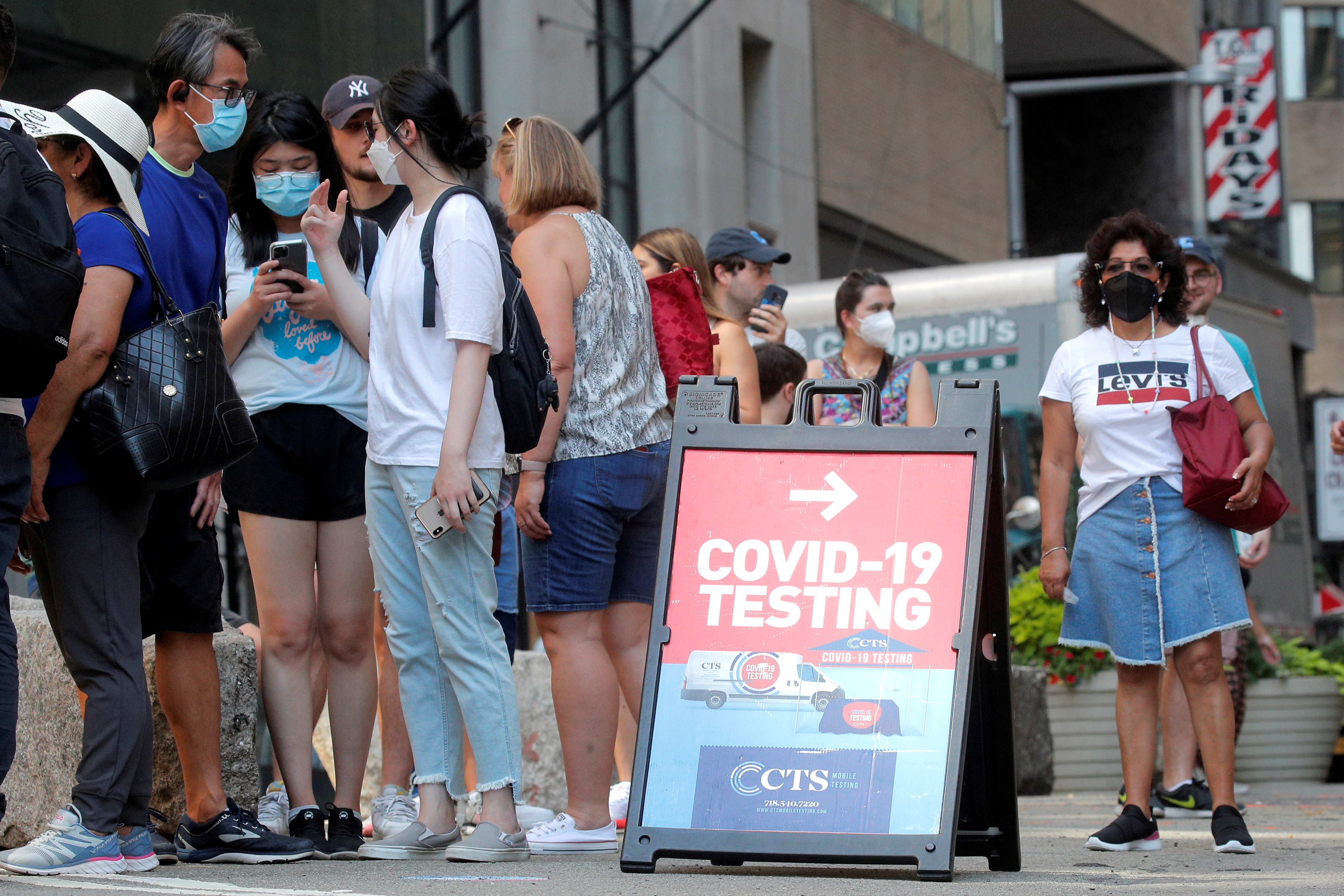 People line up at a coronavirus disease (COVID-19) testing at a mobile testing van in New York City, U.S., August 27, 2021.  REUTERS/Brendan McDermid