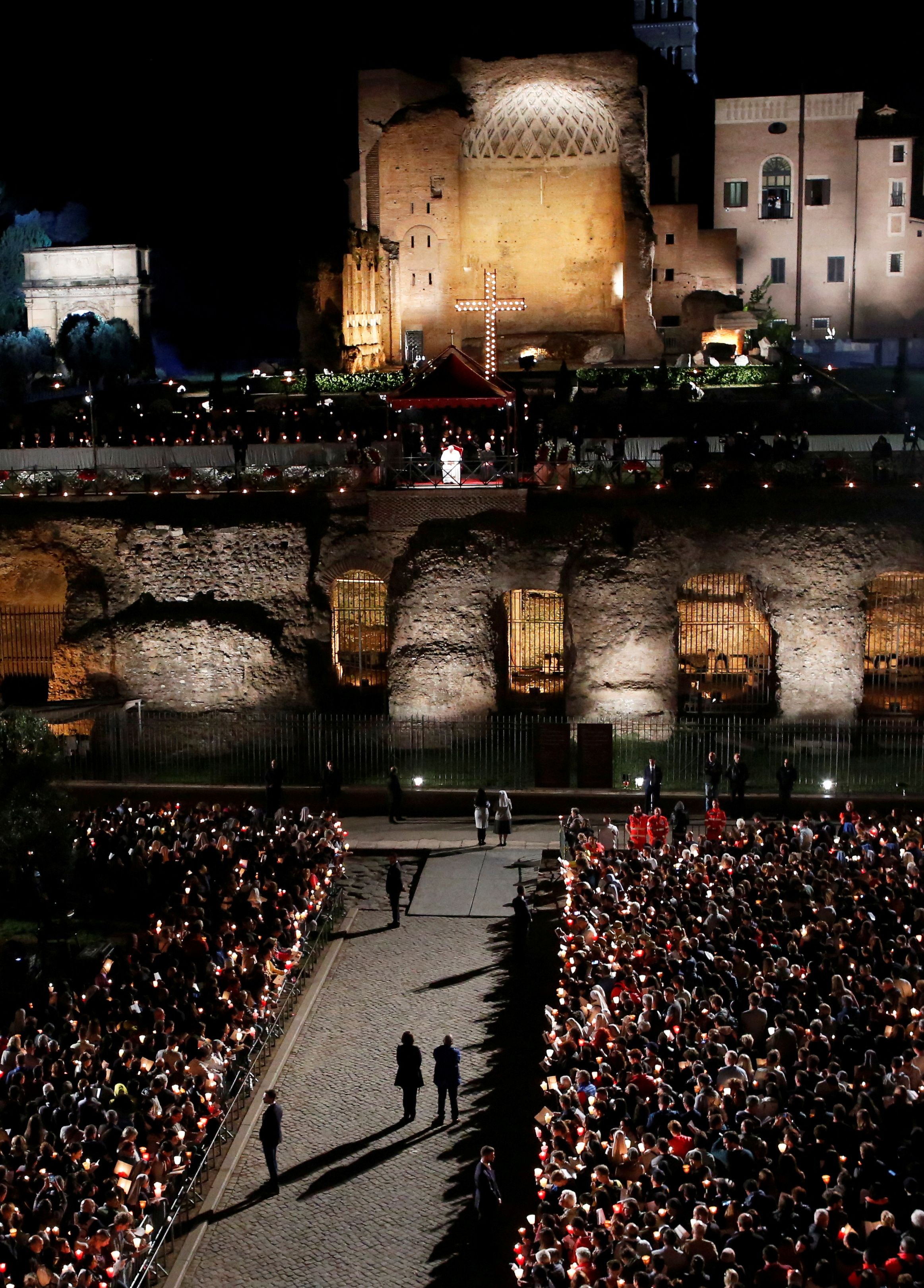 Pope Francis leads the Via Crucis procession at Rome's Colosseum