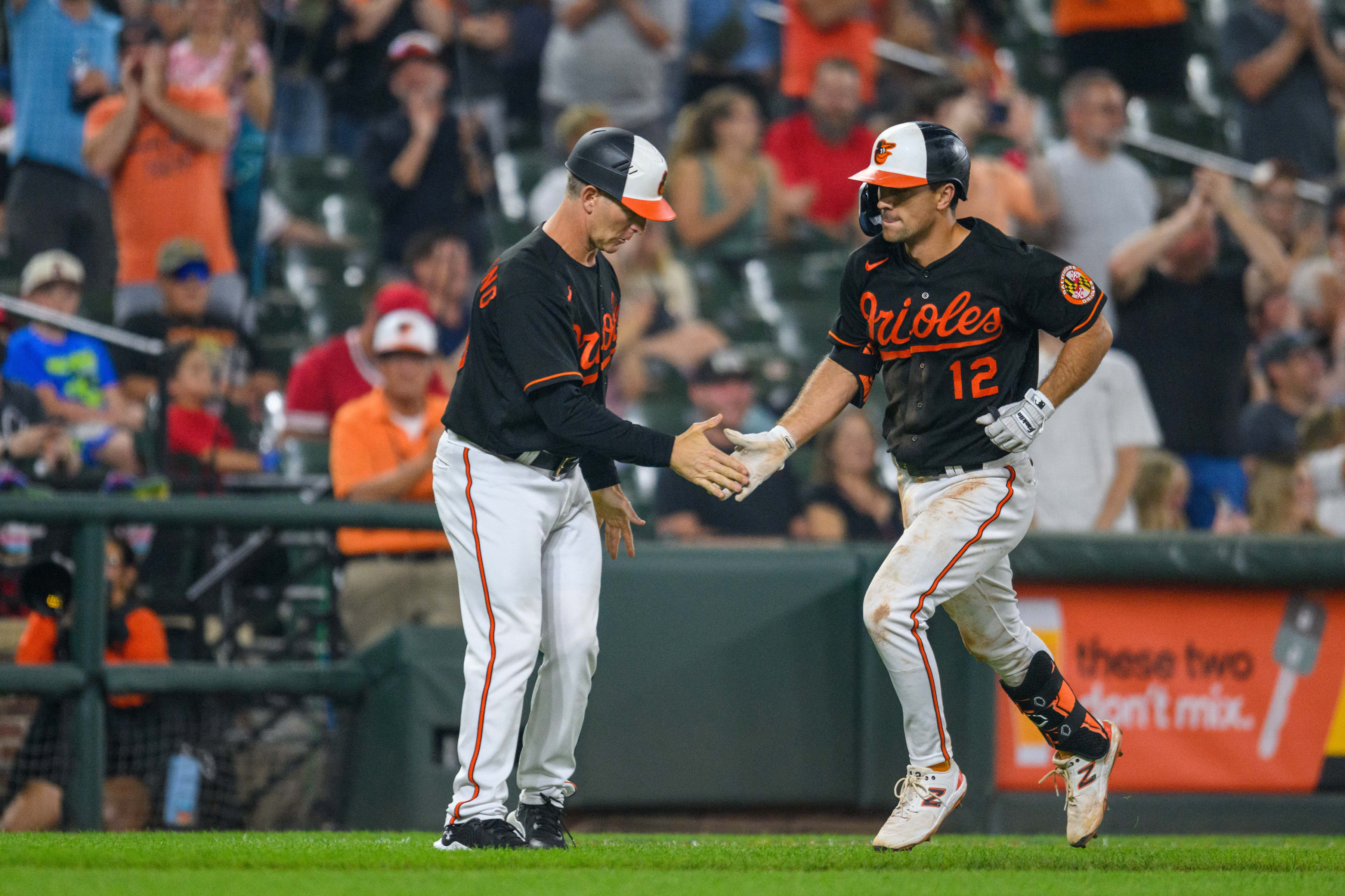 Reds beat Orioles 11-7 in 10 innings to win series at Camden Yards