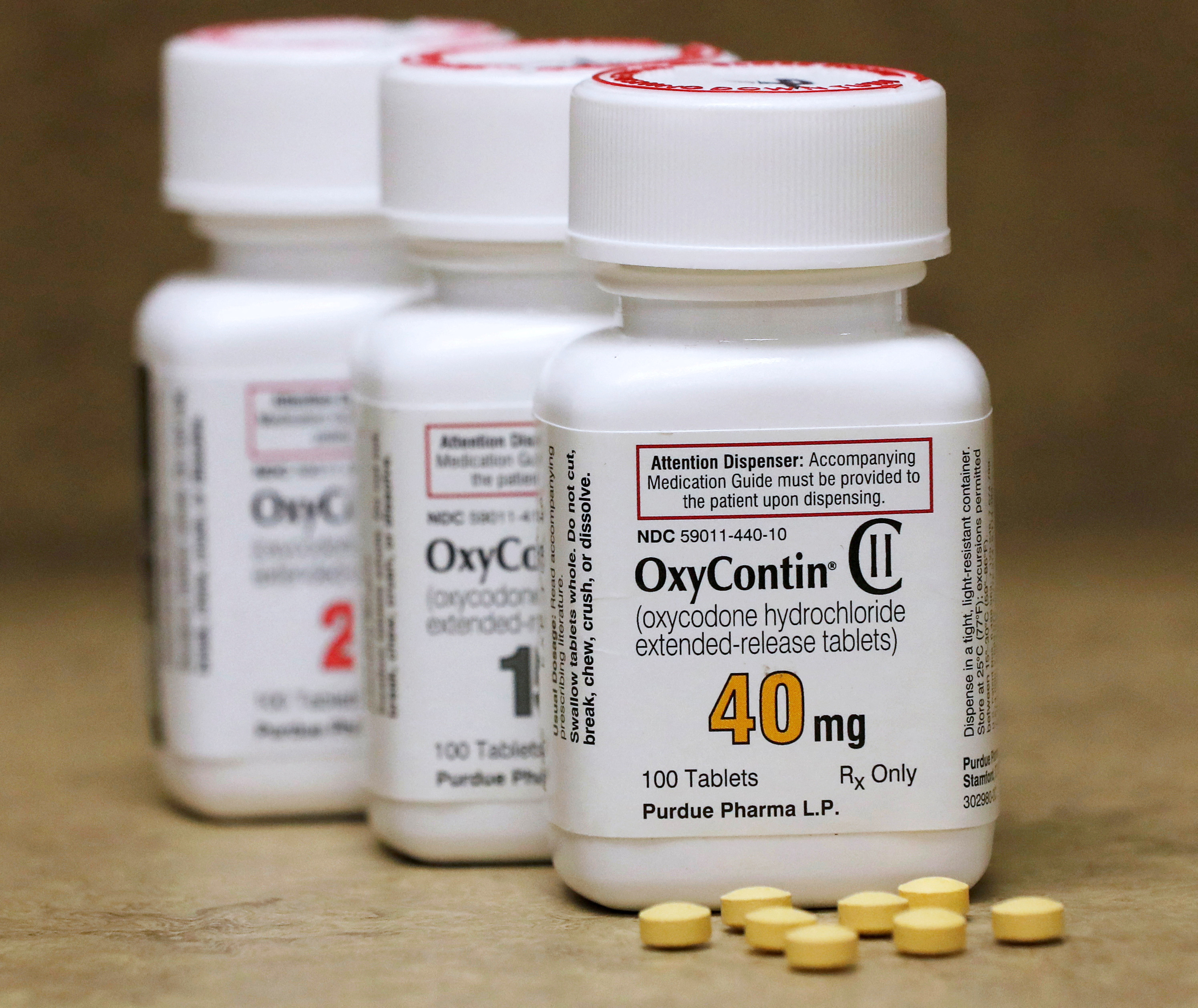 Bottles of prescription painkiller OxyContin made by Purdue Pharma LP on a counter at a local pharmacy in Provo