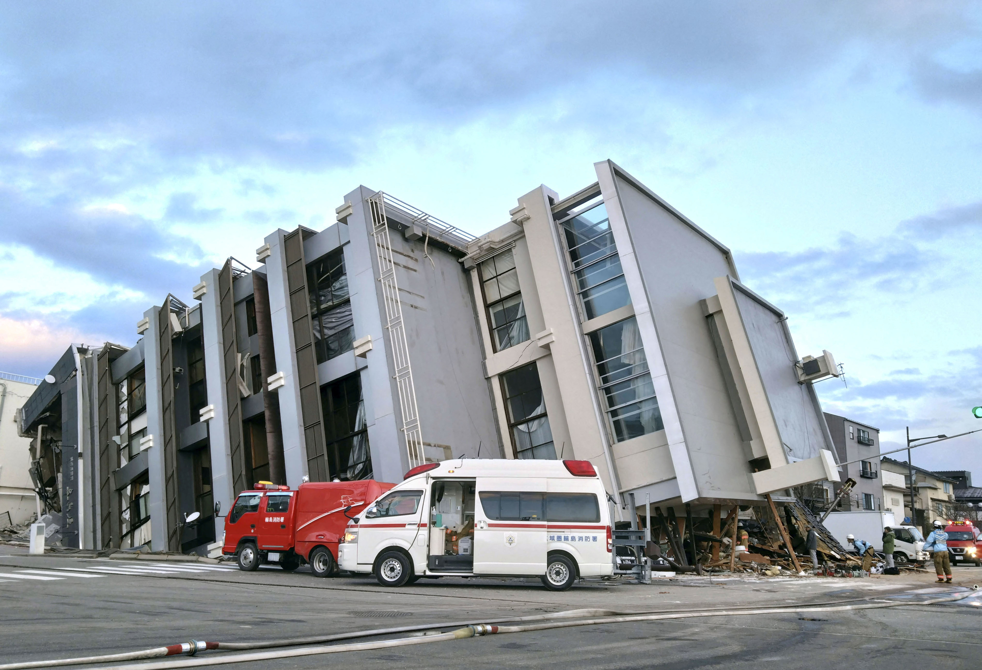 A collapsed building caused by an earthquake is seen in Wajima, Japan