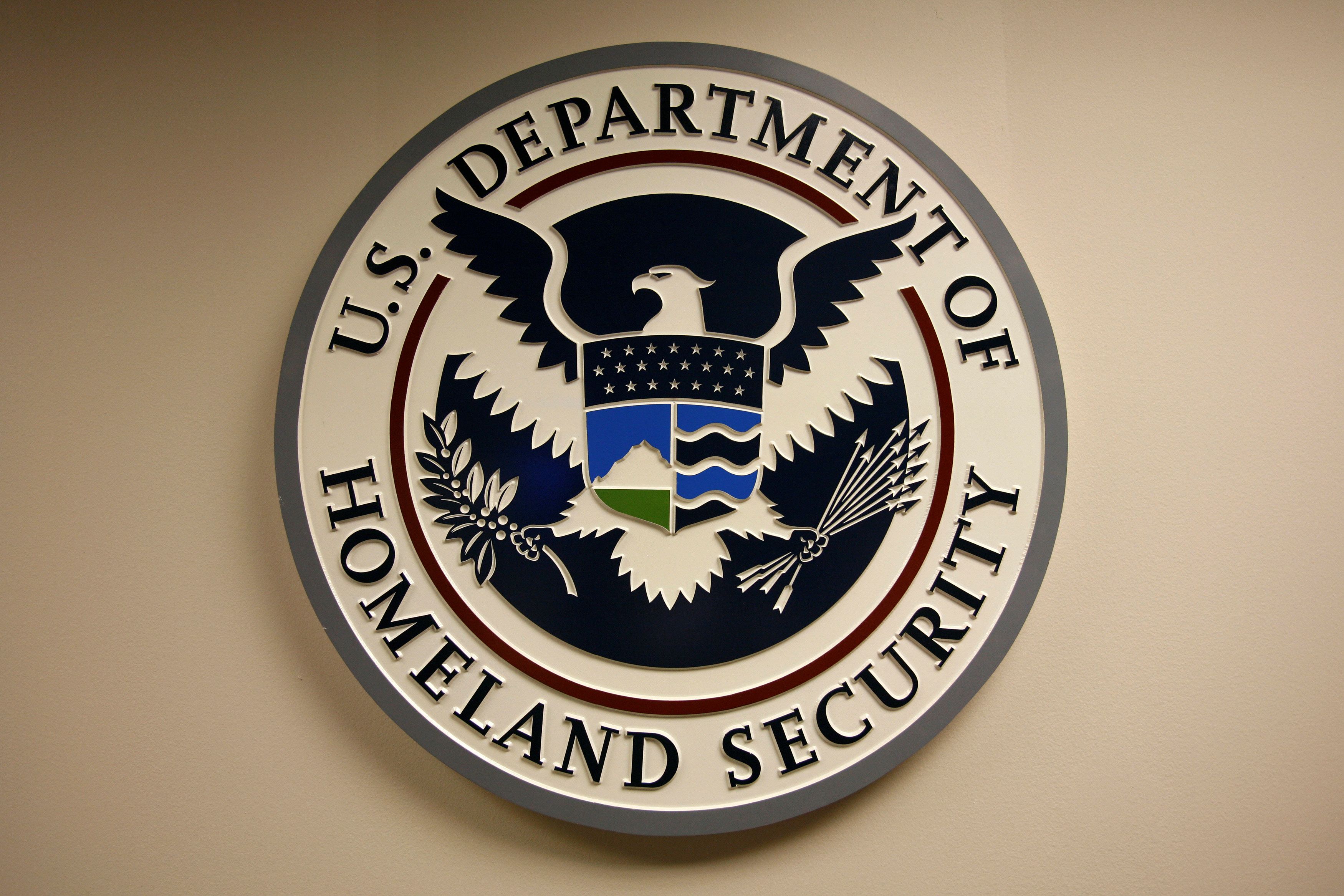 U.S. Department of Homeland Security emblem is pictured at the National Cybersecurity & Communications Integration Center (NCCIC) located just outside Washington in Arlington, Virginia September 24, 2010. REUTERS/Hyungwon Kang/File Photo