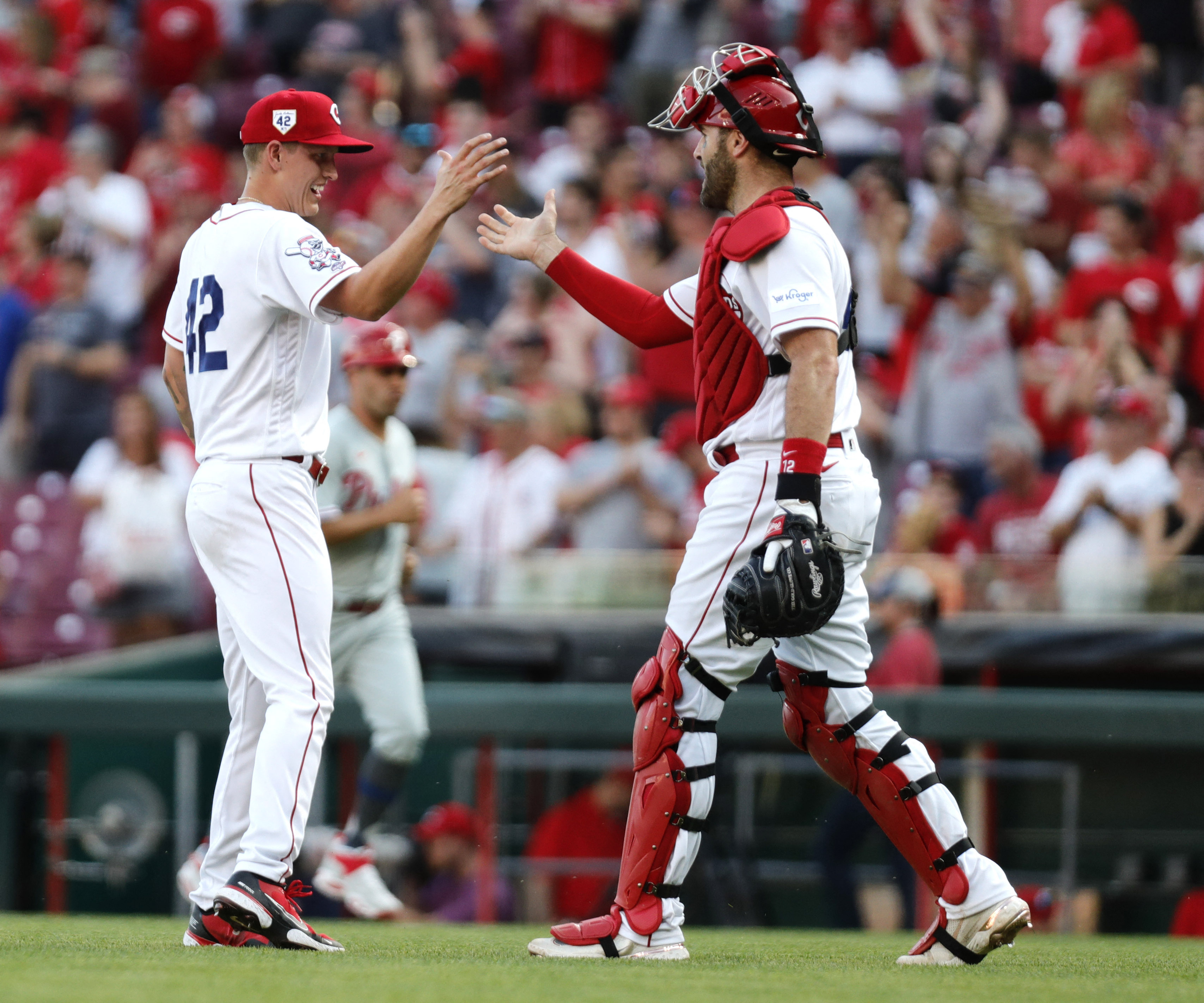 Myers homers twice, leads Reds in 13-0 rout of Phillies