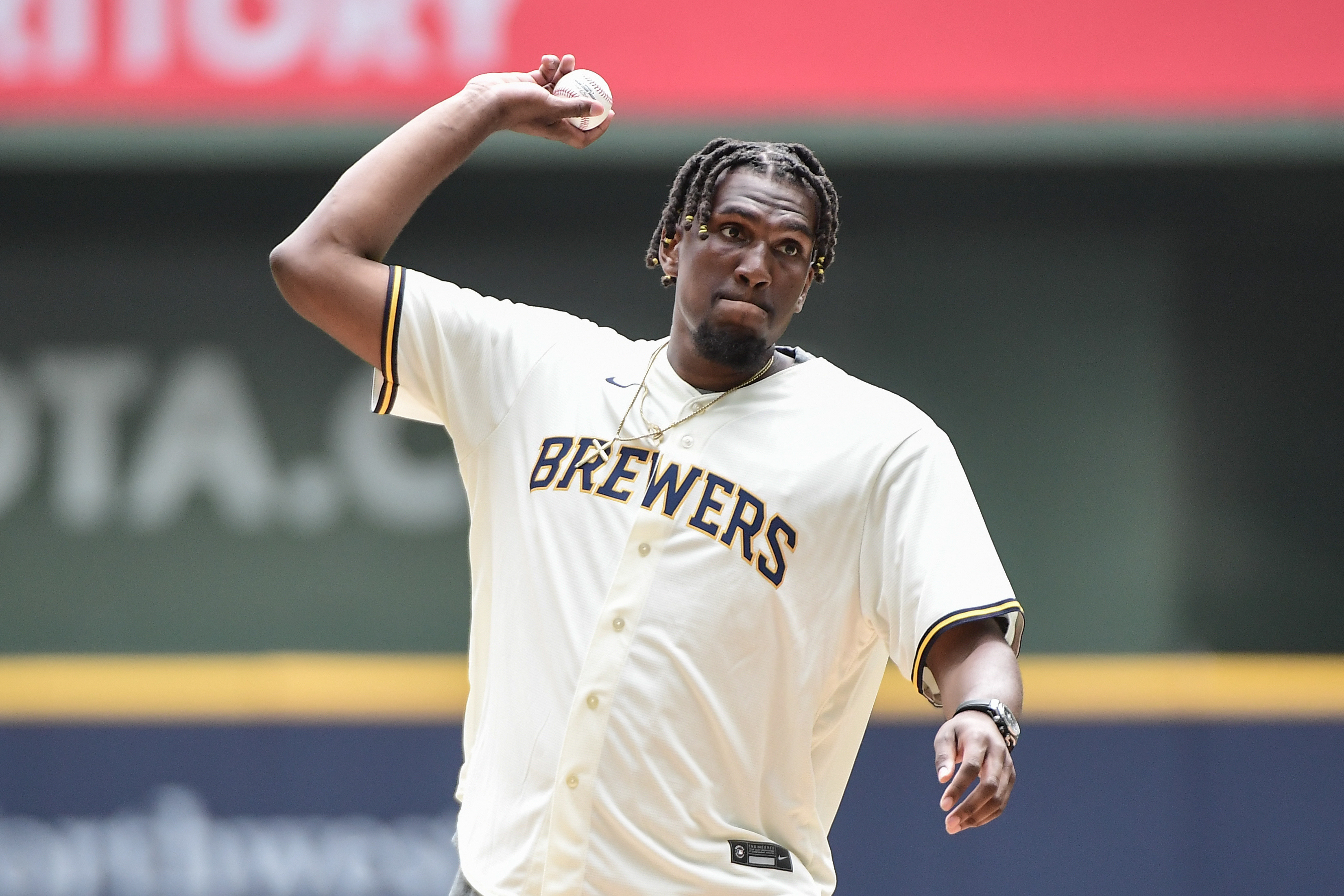 The Milwaukee Brewers score two runs on a pair of fielder's choice