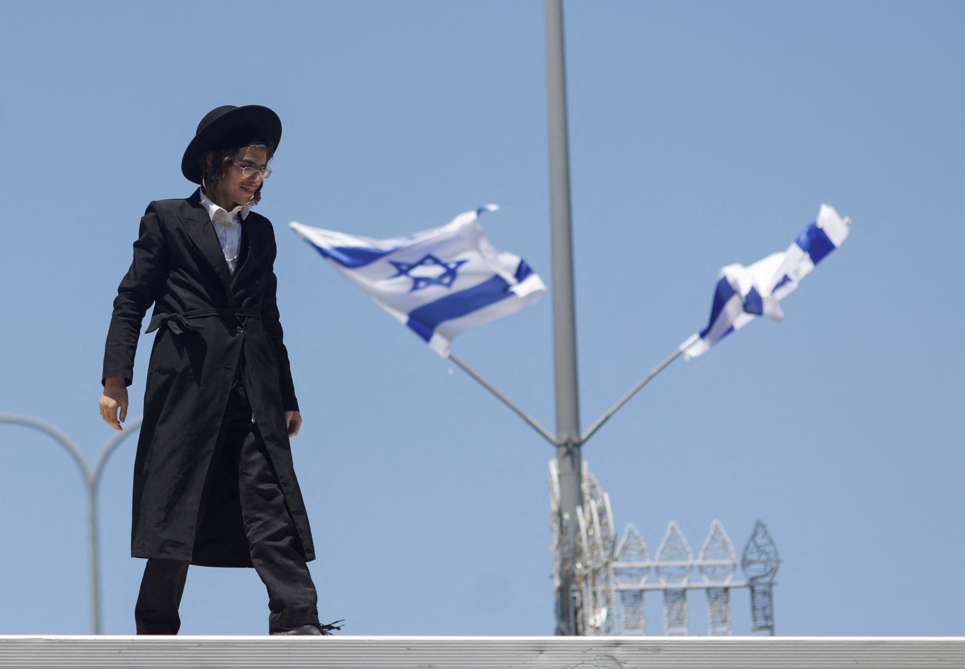 Ultra Orthodox protesters break into Israeli army base | Reuters