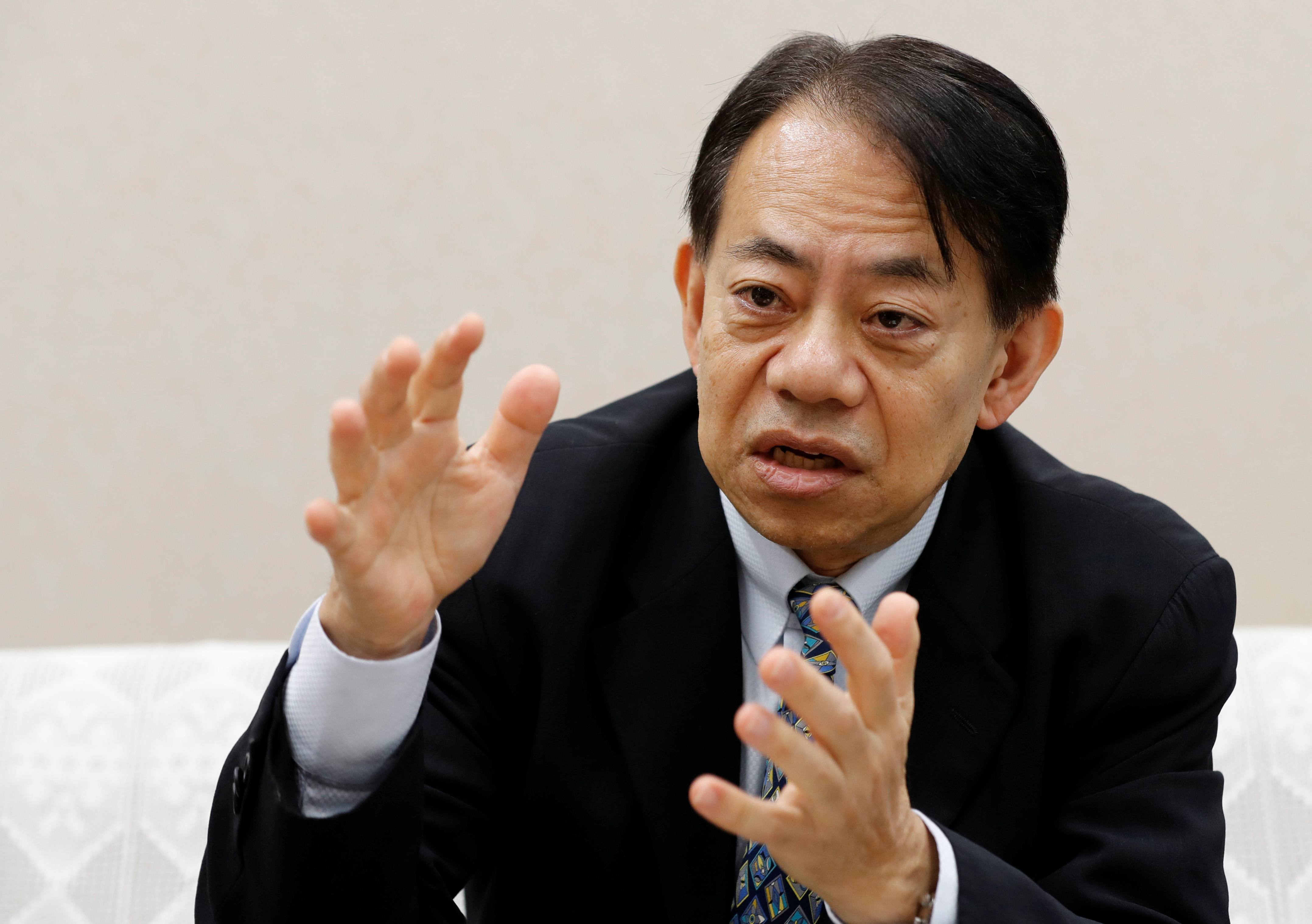 Asian Development Bank President-elect Masatsugu Asakawa speaks during an interview with Reuters in Tokyo