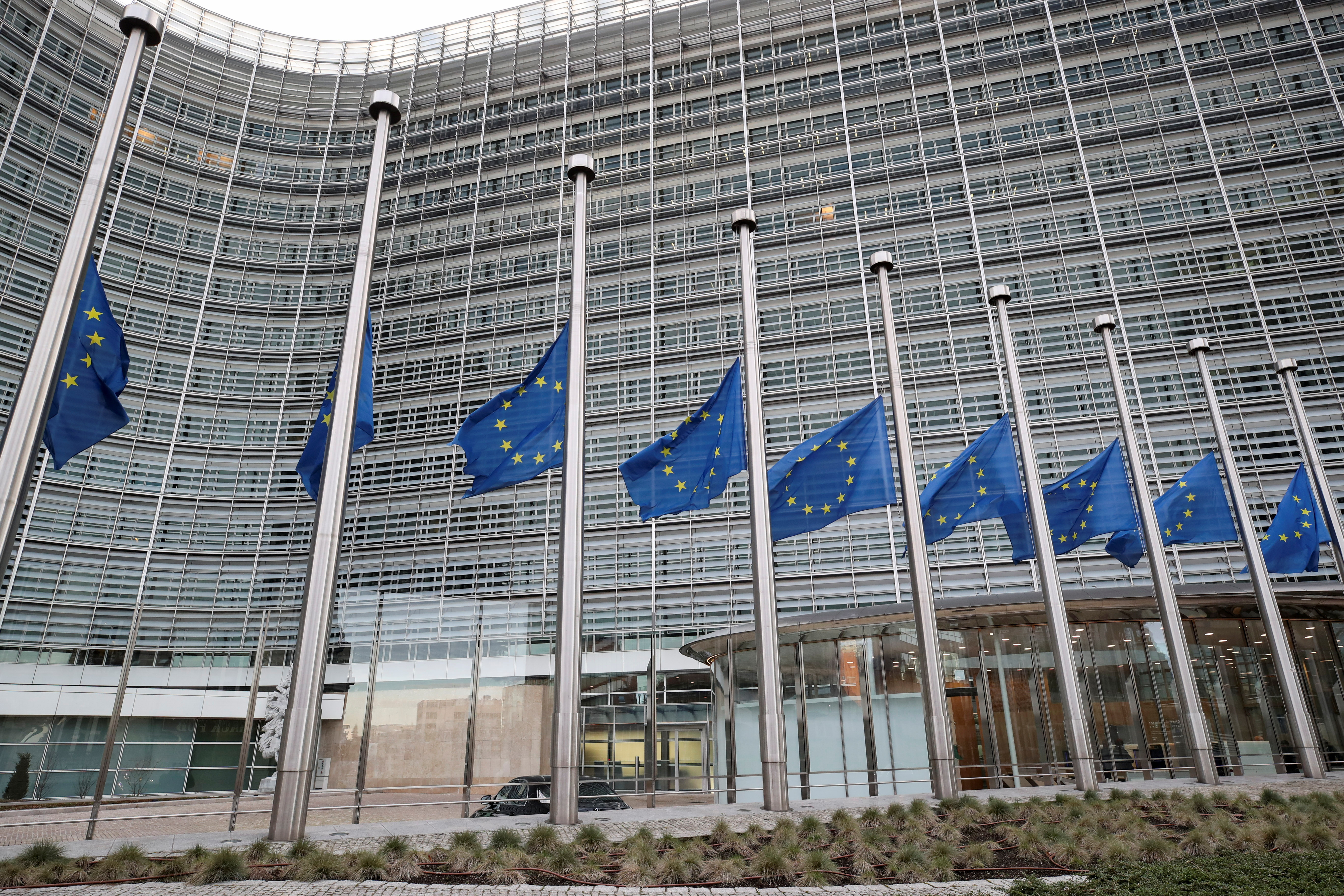 EU flags flutter at half mast in memory of late European Parliament President David Sassoli, in Brussels