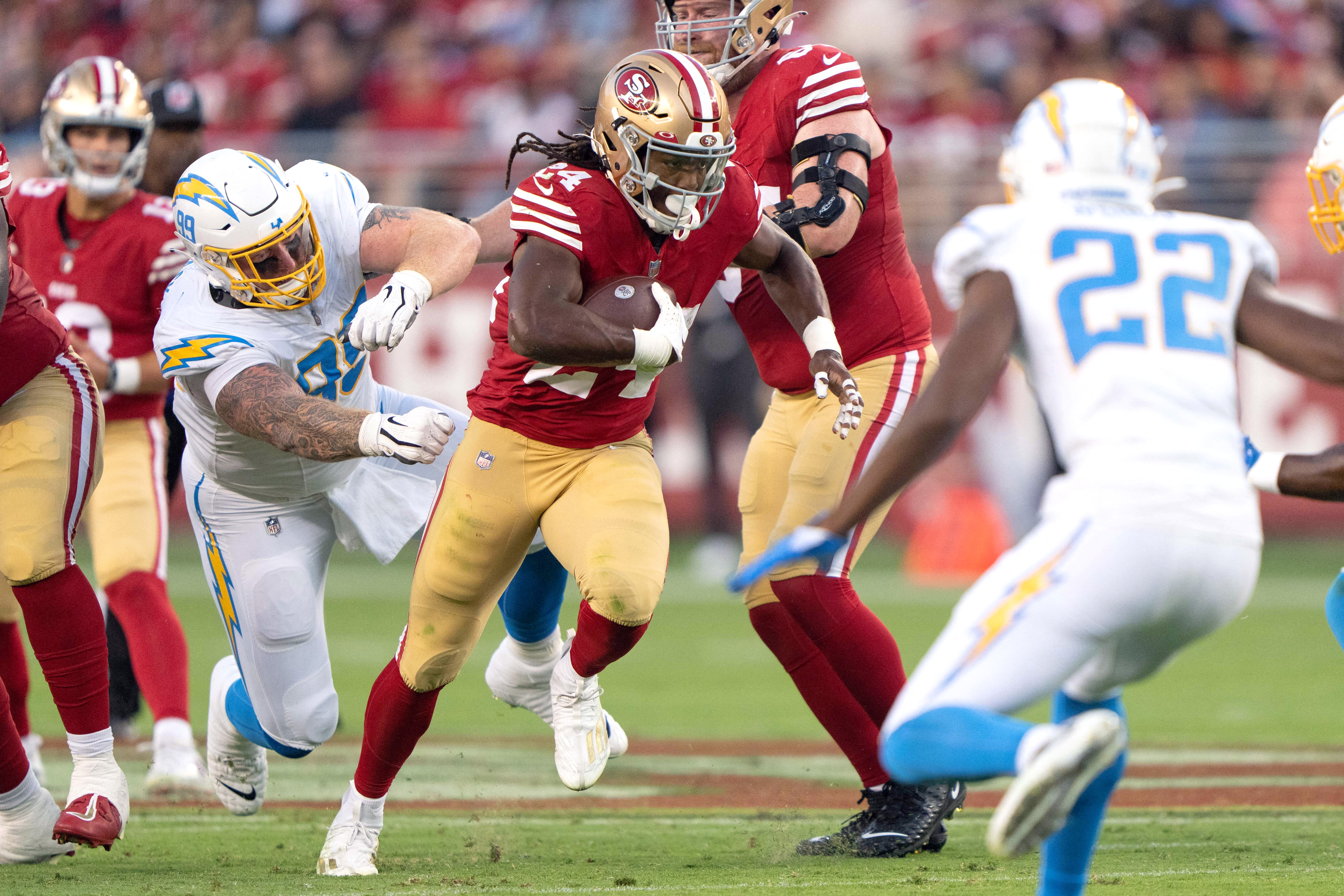 Los Angeles Chargers running back Joshua Kelley plows through pileup for  ferocious 22-yard pickup