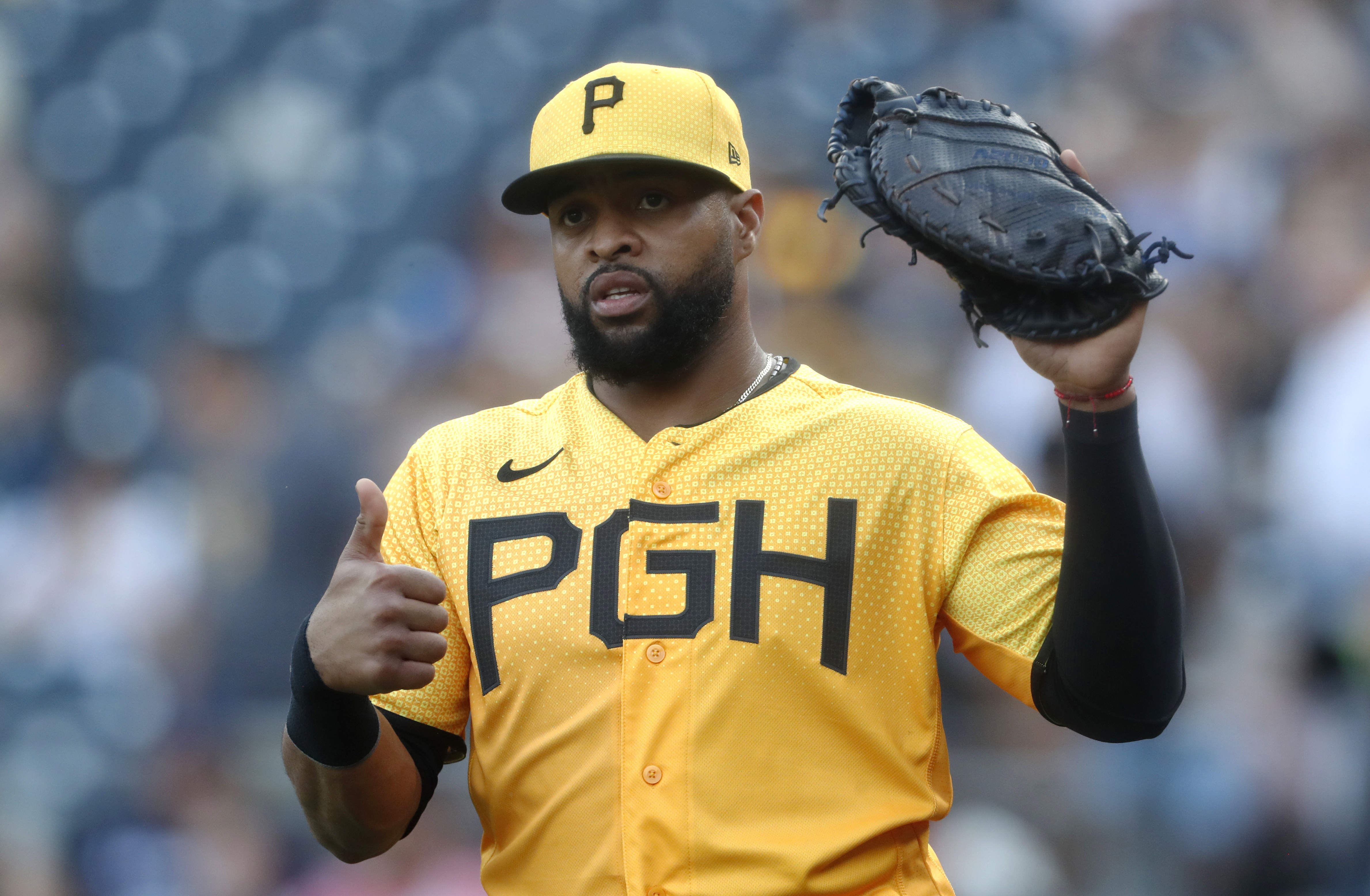 Pittsburgh Pirates' Carlos Santana hits a single during the seventh inning  of a baseball game against the Milwaukee Brewers Friday, June 16, 2023, in  Milwaukee. (AP Photo/Morry Gash Stock Photo - Alamy