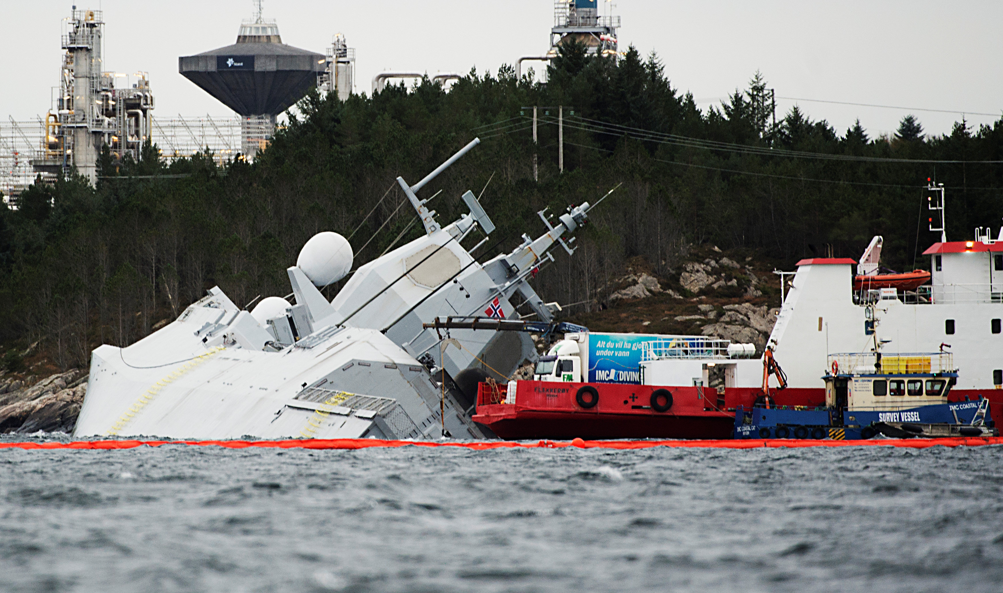 The Norwegian frigate "KNM Helge Ingstad" takes on water after a collision with the tanker "Sola TS" in Oygarden