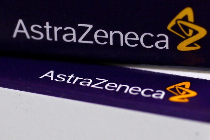The logo of AstraZeneca is seen on medication packages in a pharmacy in London