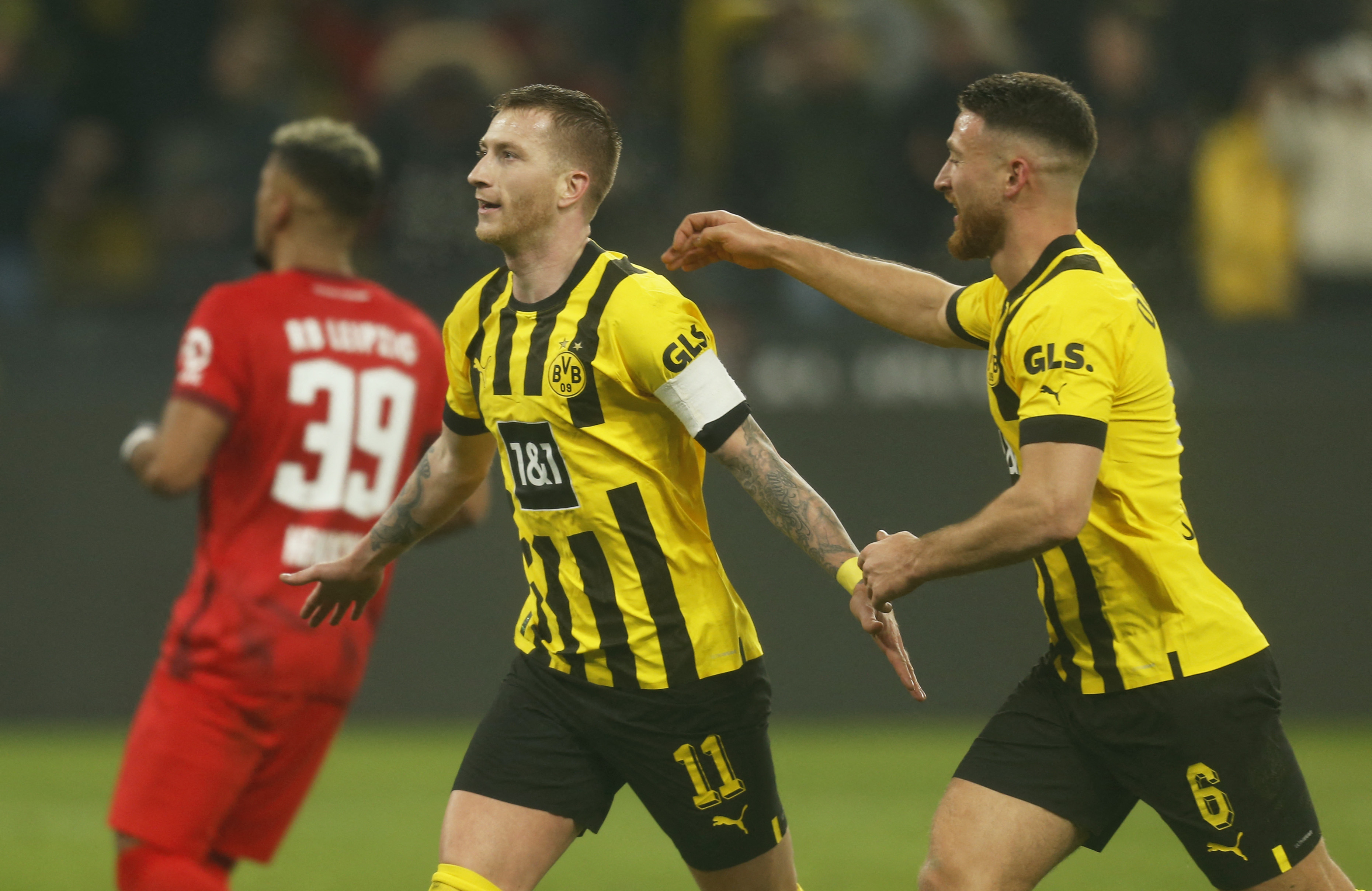 Efficient Dortmund edge past Leipzig 2-1 to move into top spot Reuters