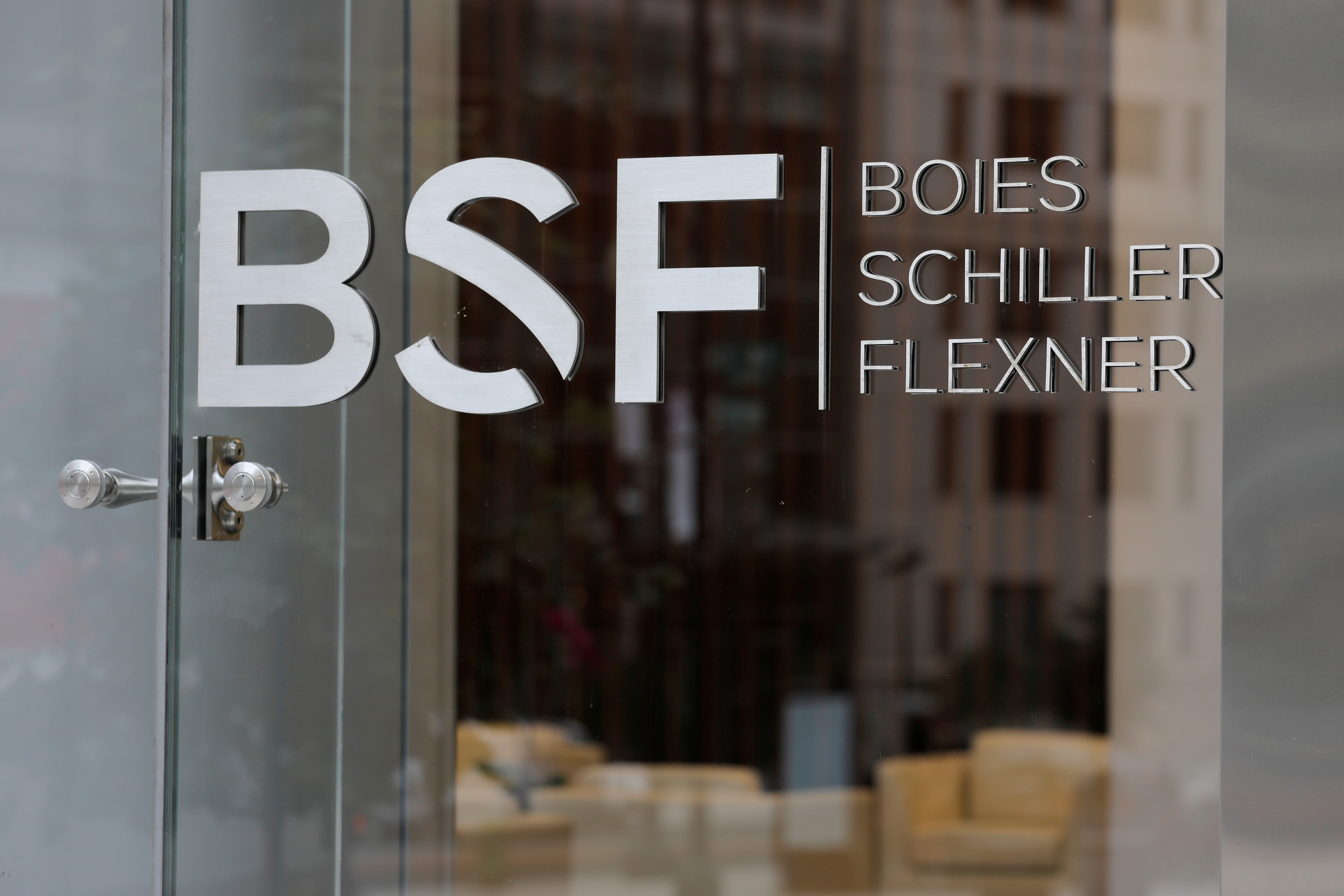The logo of law firm Boies Schiller Flexner LLP is seen outside of their office in Washington, D.C.