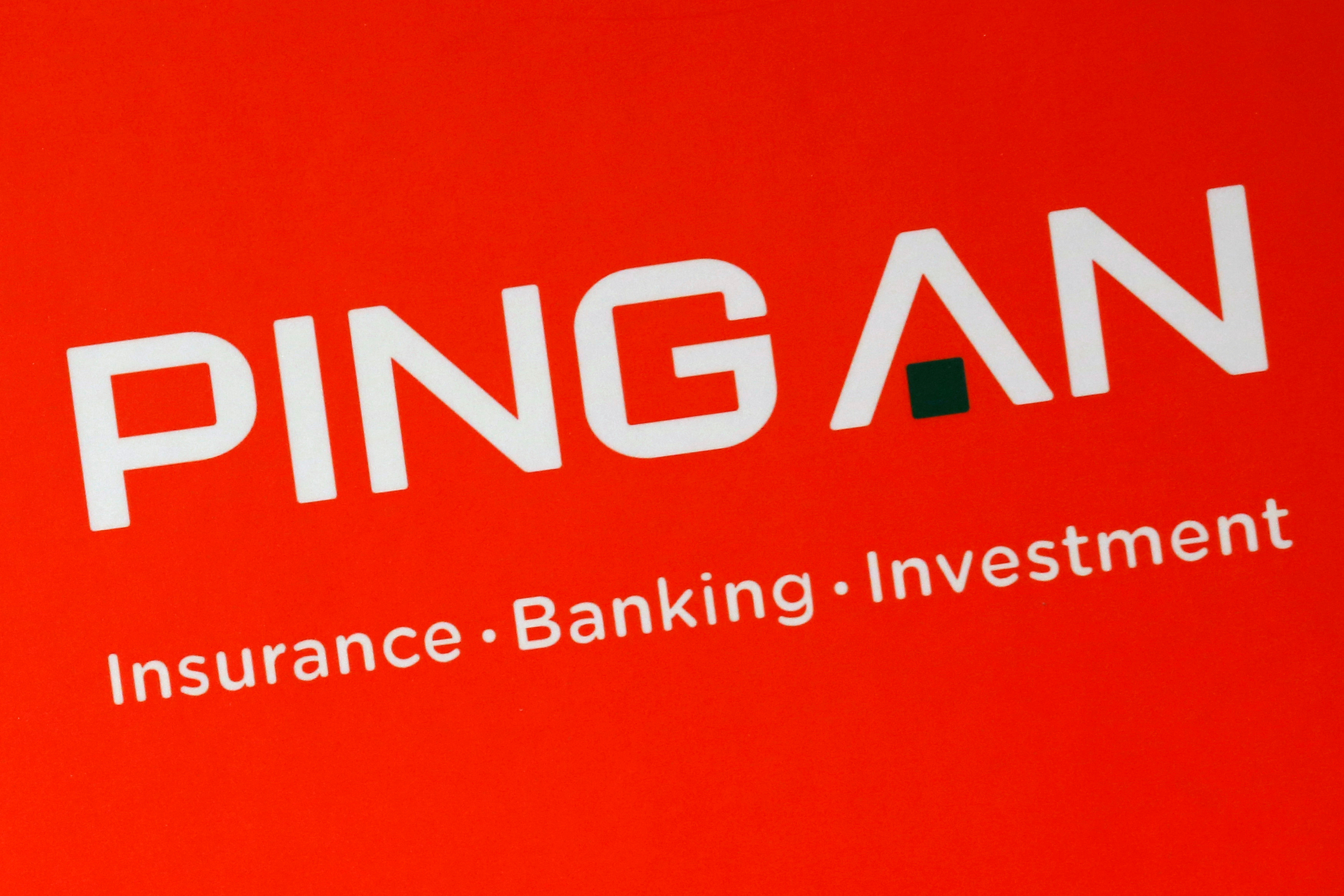 File photo of company logo of Ping An Insurance Group shown at a news conference following the company's announcement of its annual results in Hong Kong