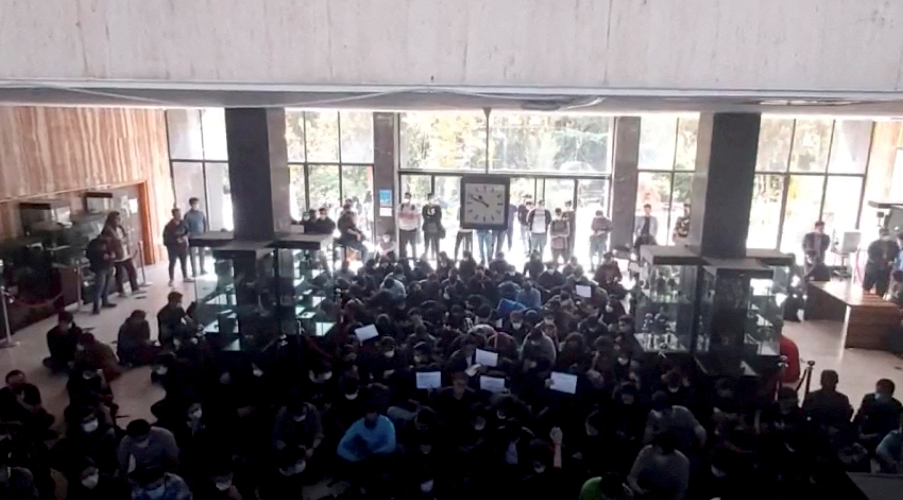 Protesters chant at vigil for Amini in Tehran