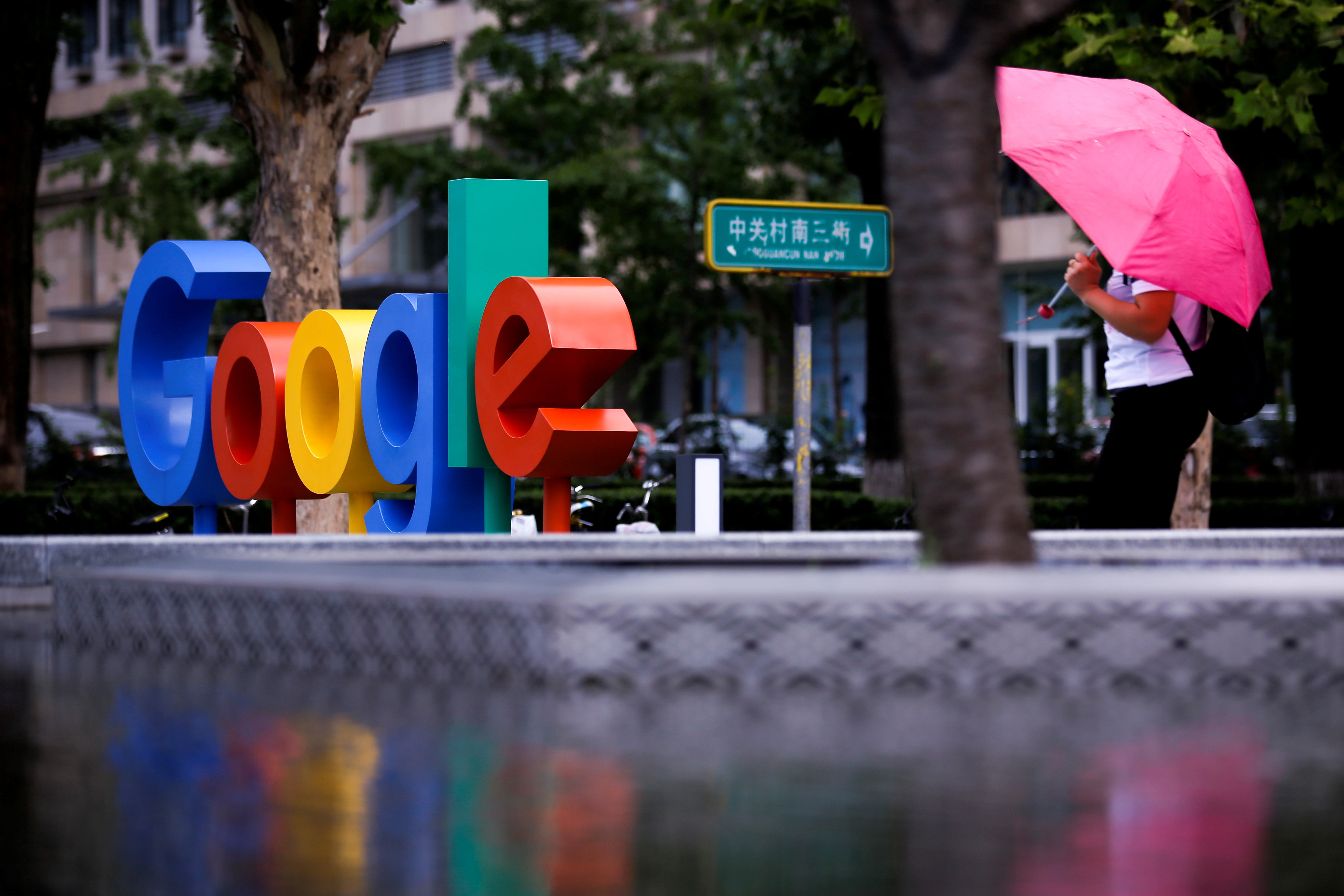 The brand logo of Alphabet Inc's Google is seen outside its office in Beijing, China, August 8, 2018.