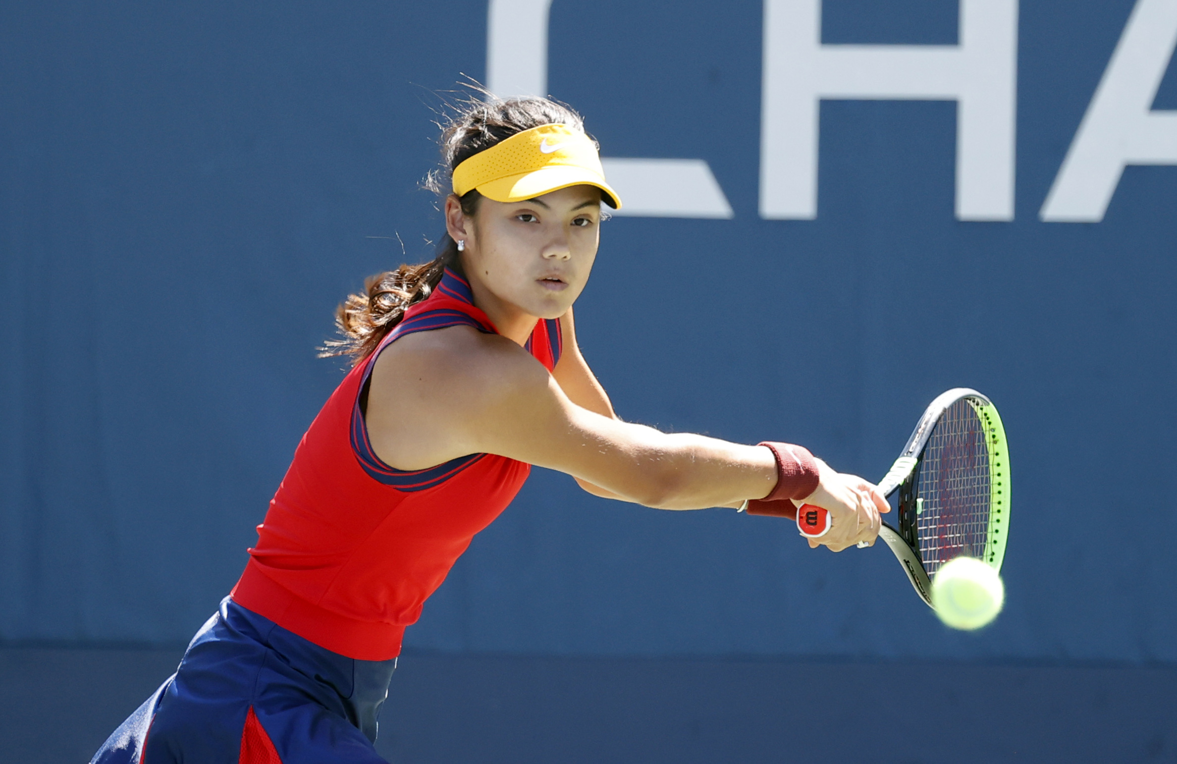 Sep 2, 2021; Flushing, NY, USA; Emma Raducanu of Great Britain hits a shot against Shuai Zhang of China in a second round match on day four of the 2021 U.S. Open tennis tournament at USTA Billie Jean King National Tennis Center. Mandatory Credit: Jerry Lai-USA TODAY Sports