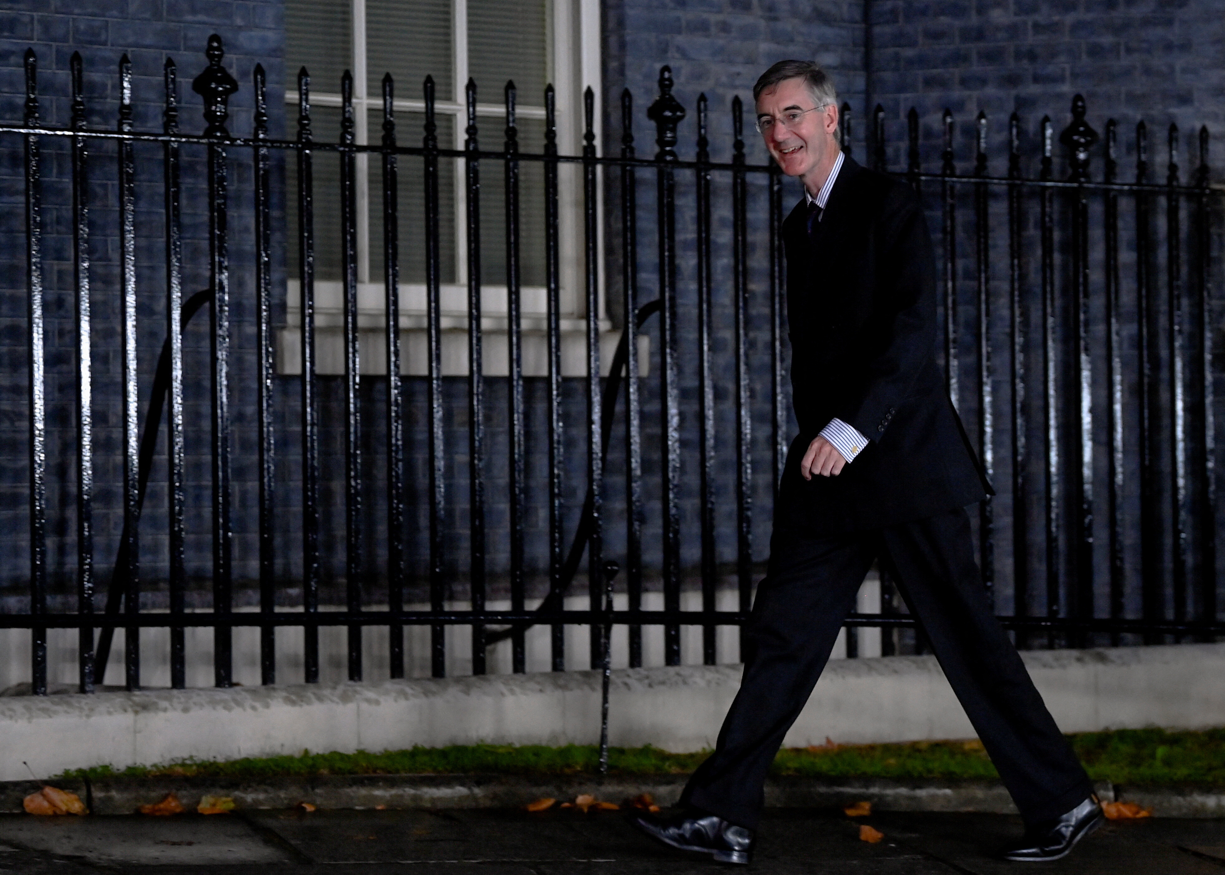 Jacob Rees-Mogg walks outside Number 10 Downing Street in London
