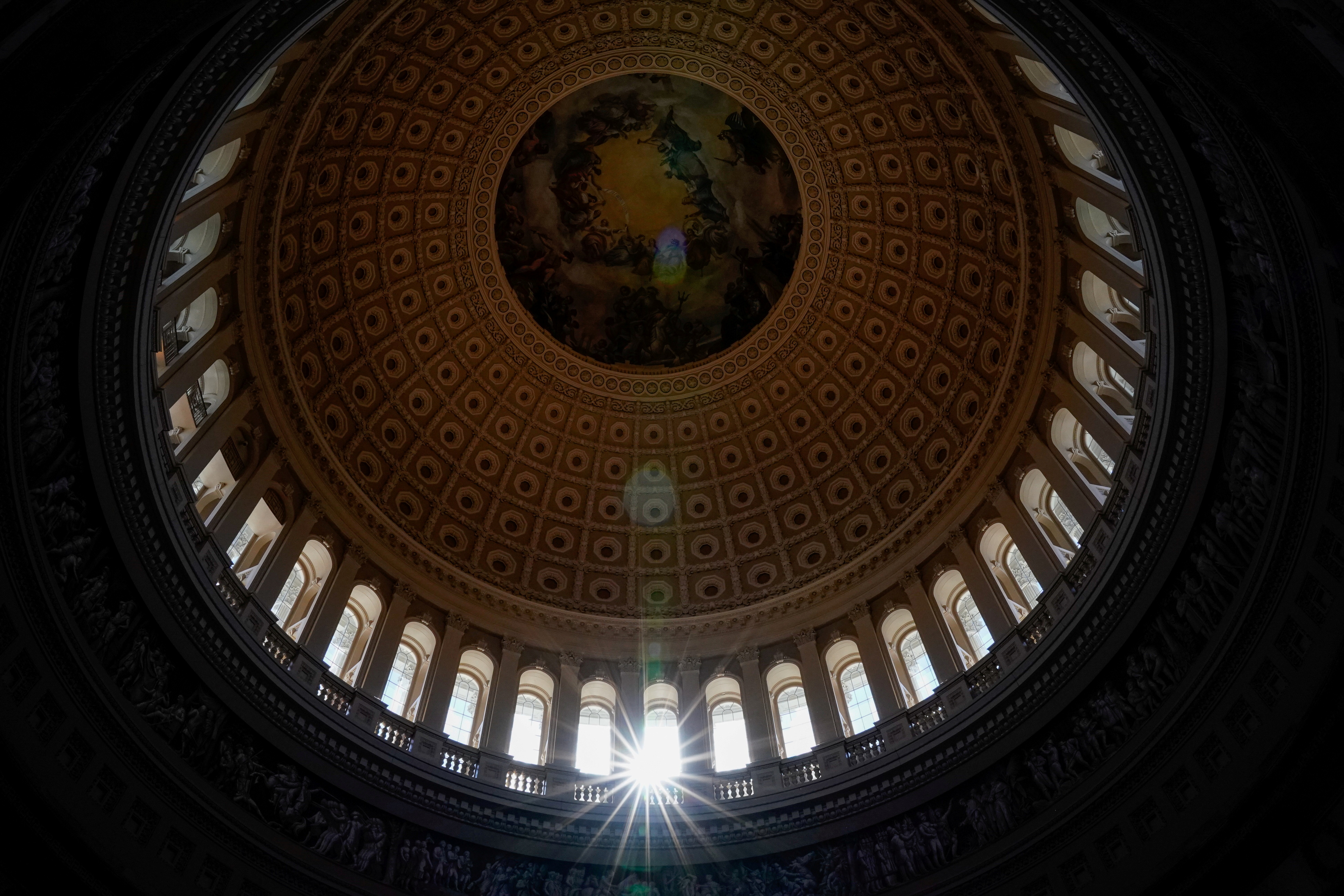 Sunlight shines through U.S. Capitol rotunda in Washington