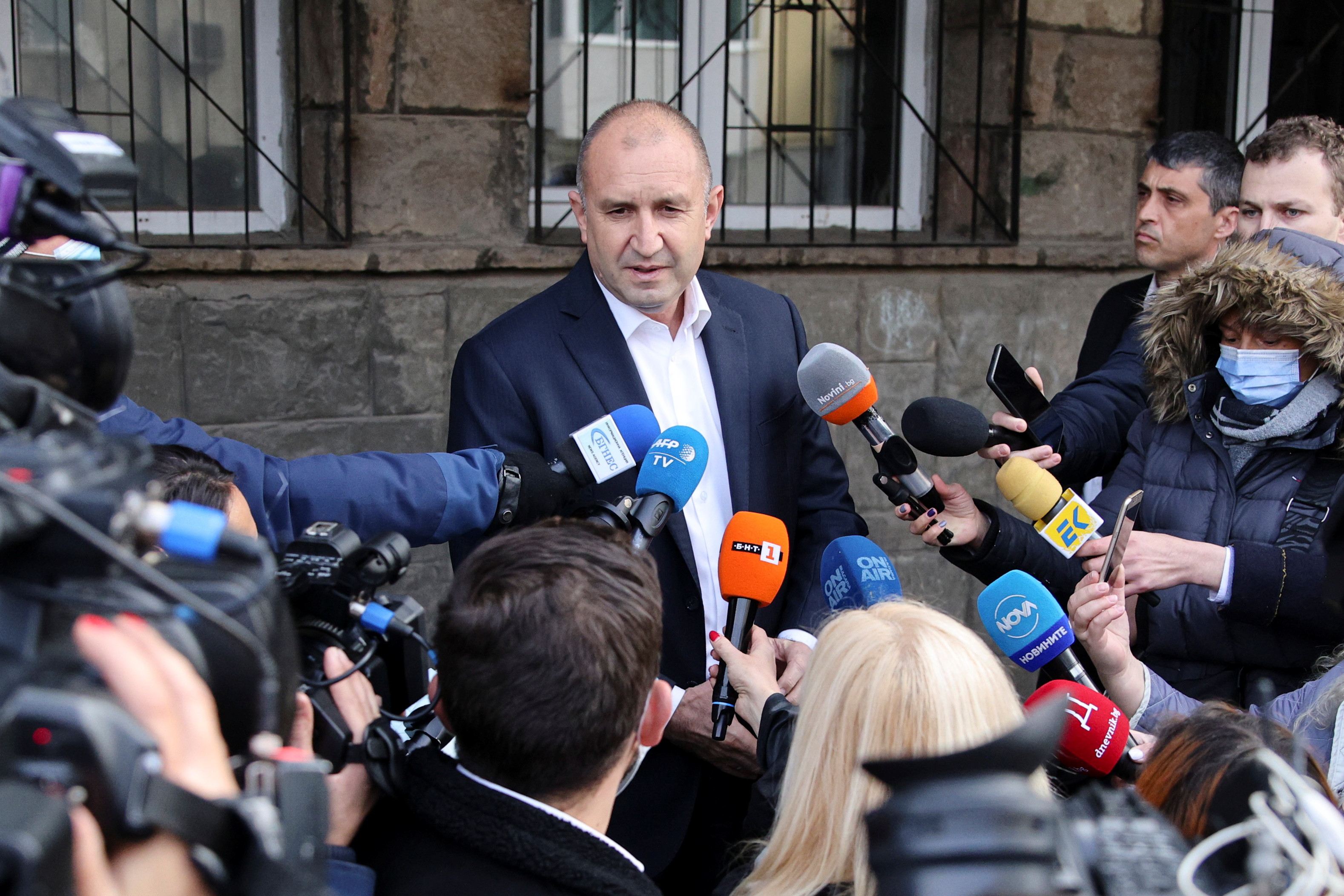 Incumbent President Rumen Radev speaks to the media after casting his vote at a polling station during a run-off of the presidential election, in Sofia, Bulgaria, November 21, 2021. REUTERS/Stoyan Nenov