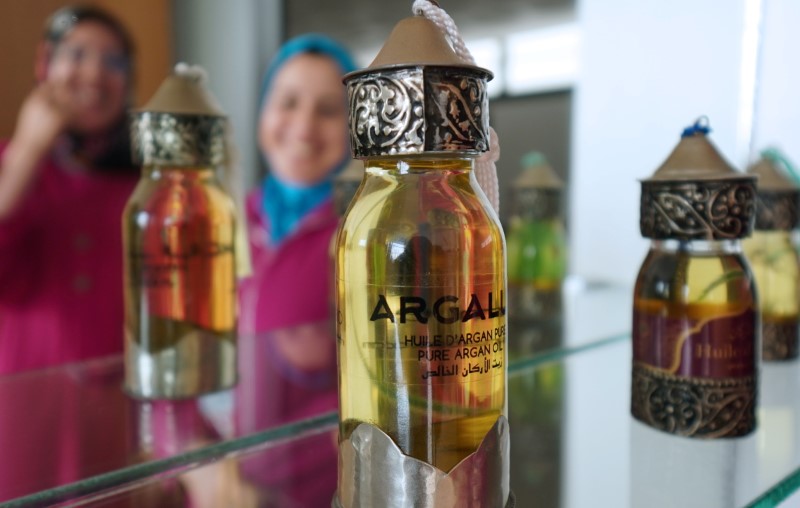 Argan oil bottles are displayed for sale inside a showroom in Agadir