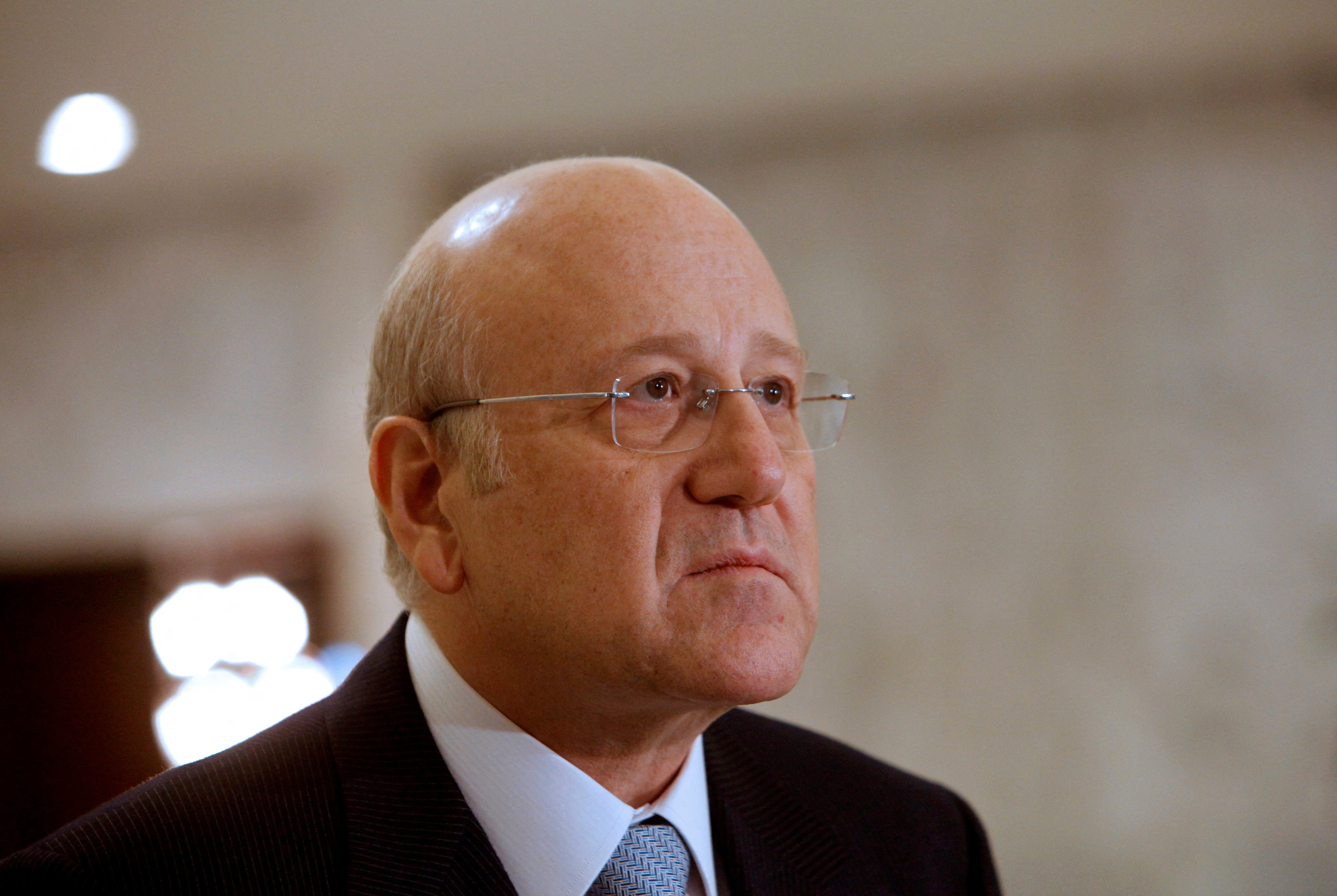 Lebanese prime minister-designate Mikati attends a news conference in Baabda