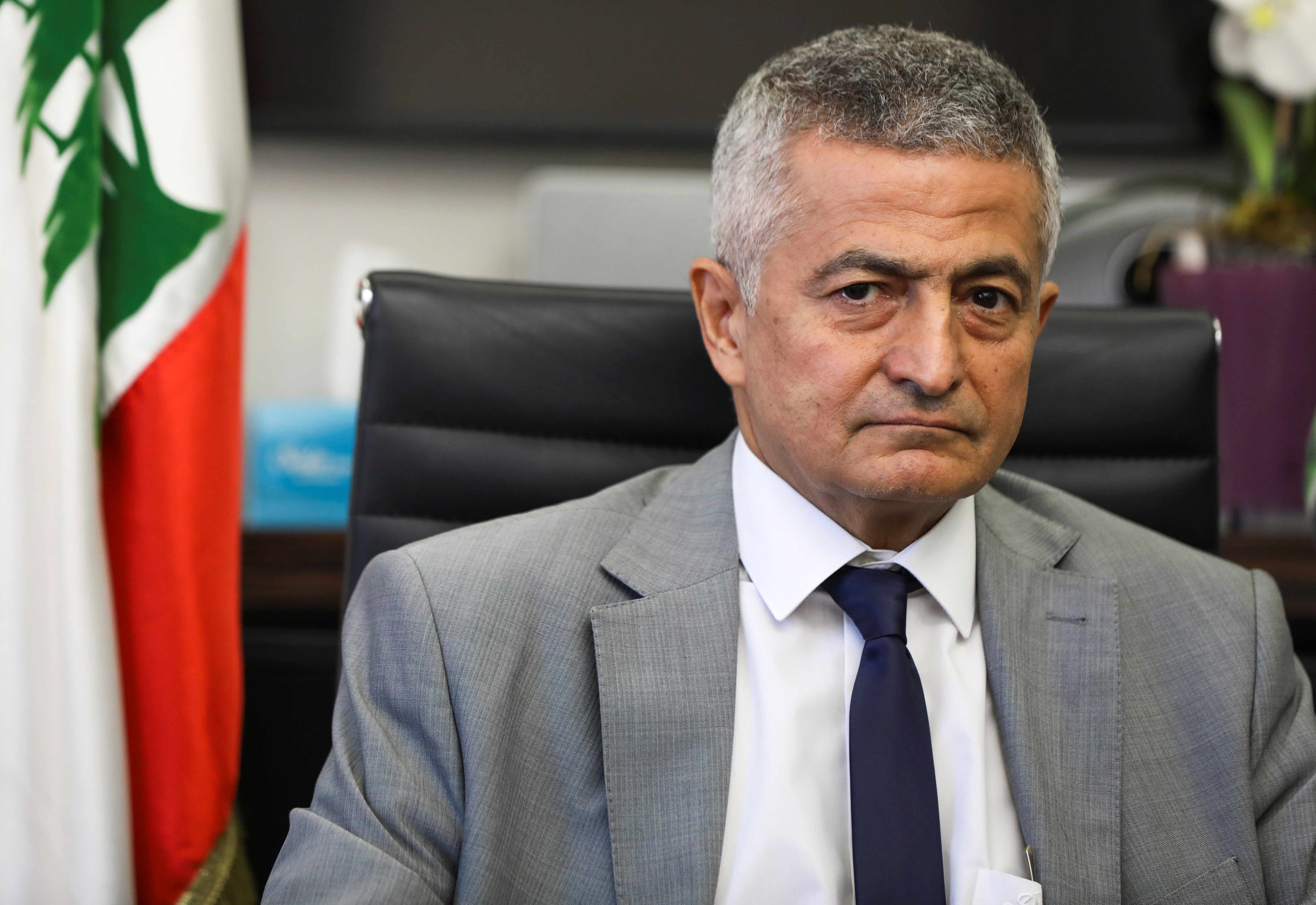 Lebanon's newly appointed Finance Minister Youssef Khalil looks on during a handover ceremony in Beirut