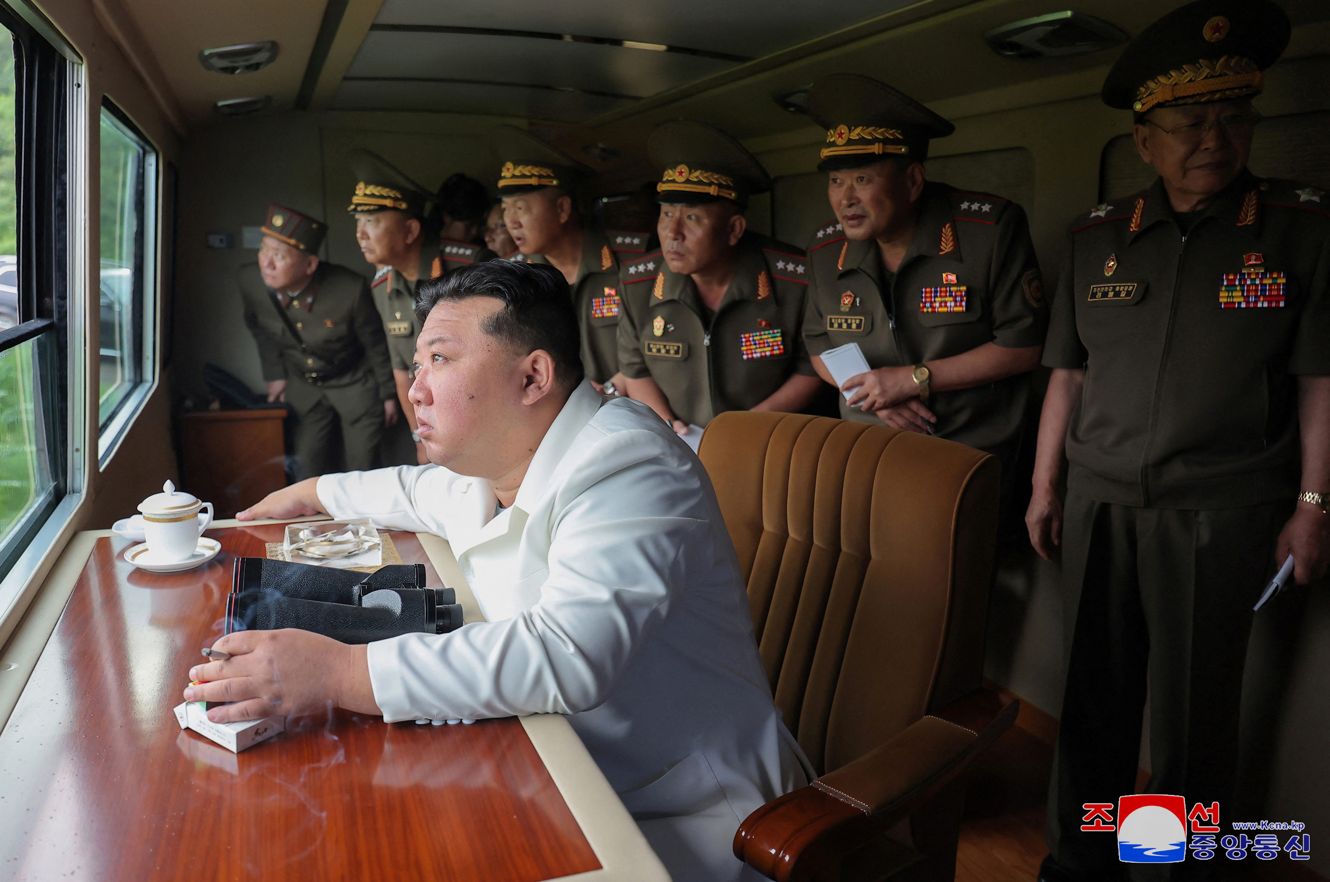 North Korea's Kim attends test-firing of rocket launcher