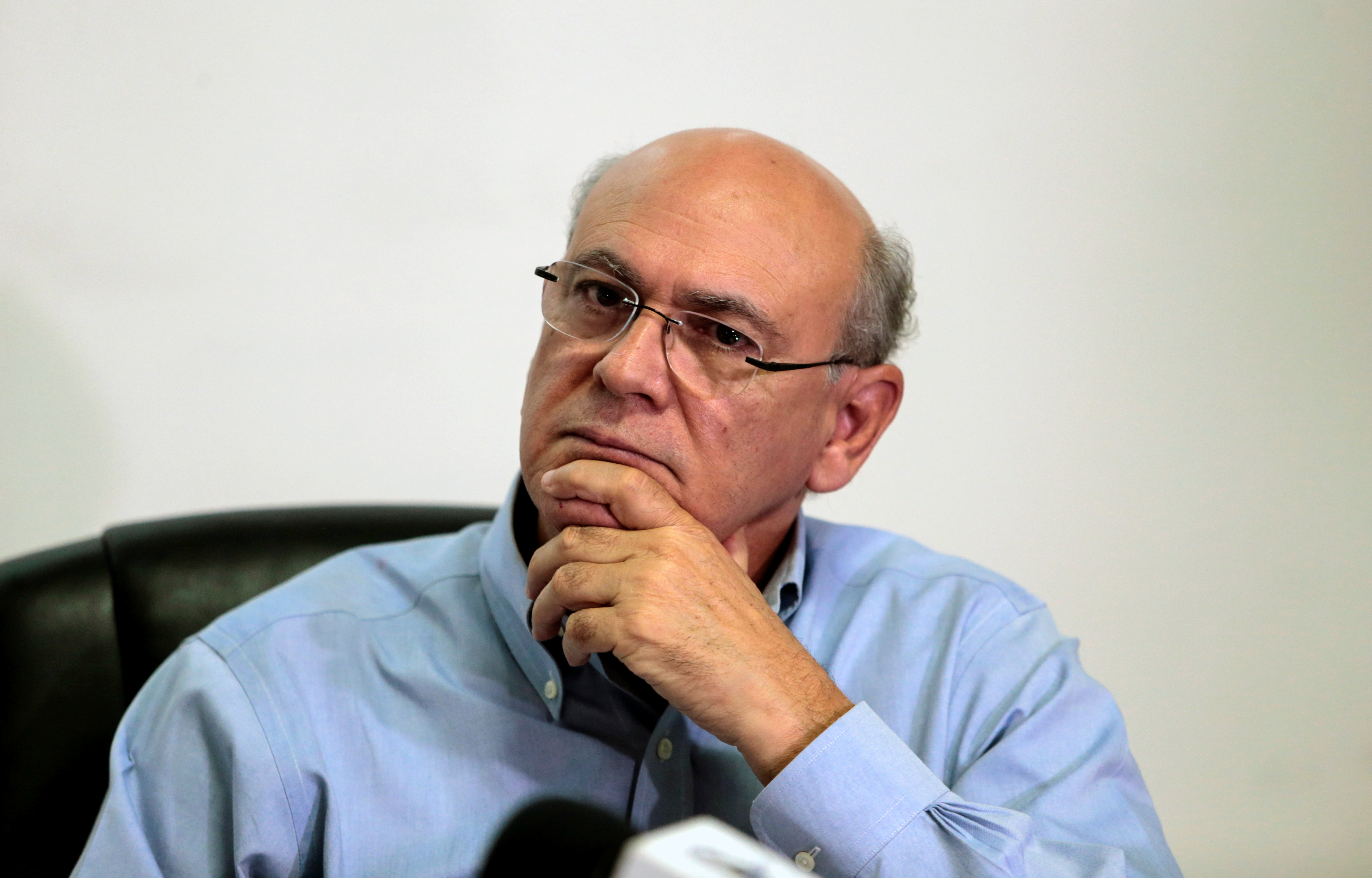 Journalist Carlos Fernando Chamorro, critic of the government of President Daniel Ortega, listens to question of a journalist during a news conference in Managua