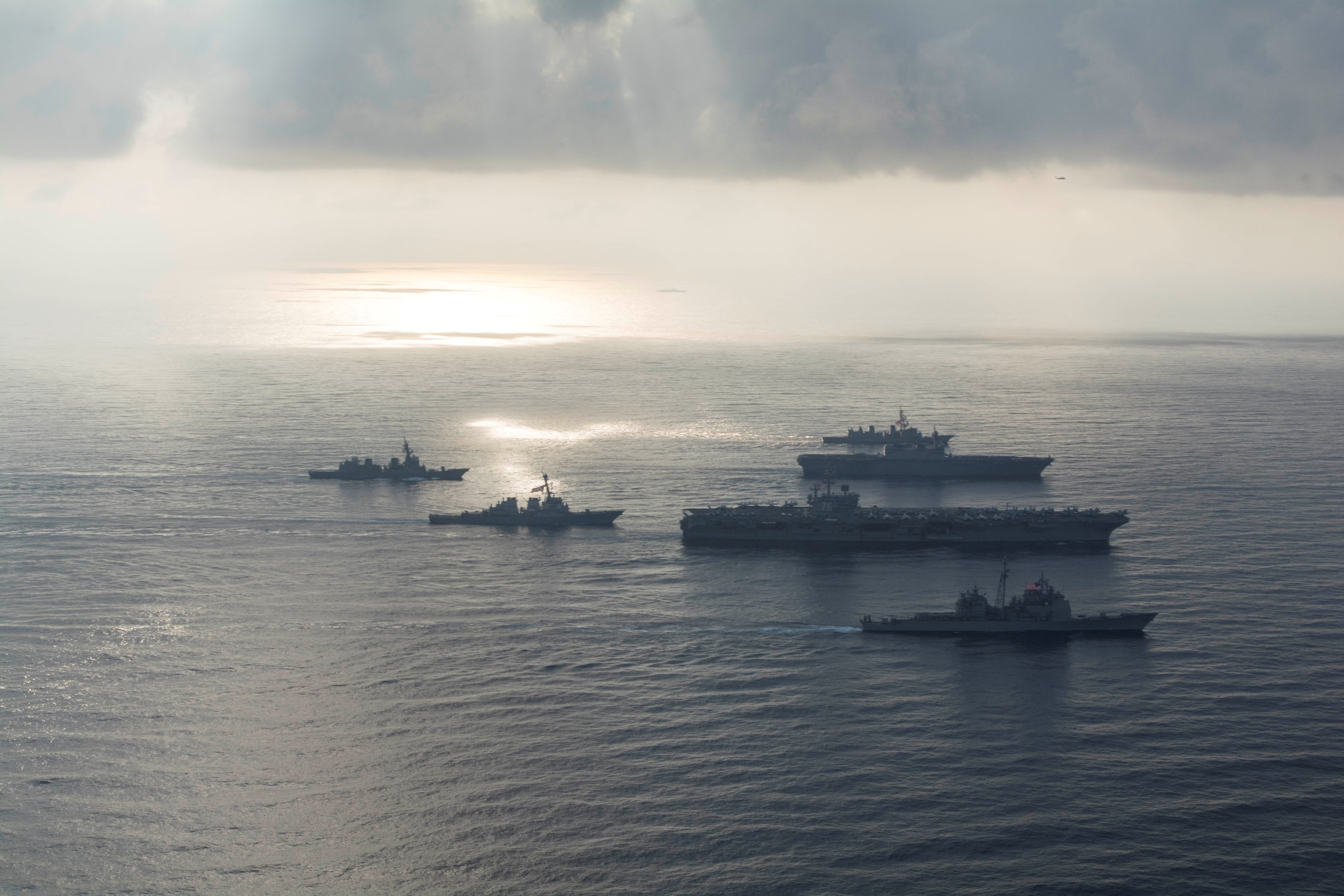 The Ronald Reagan Strike Group ship's aircraft carrier USS Ronald Reagan conduct an exercise with the Japanese Maritime Self-Defense Force ships