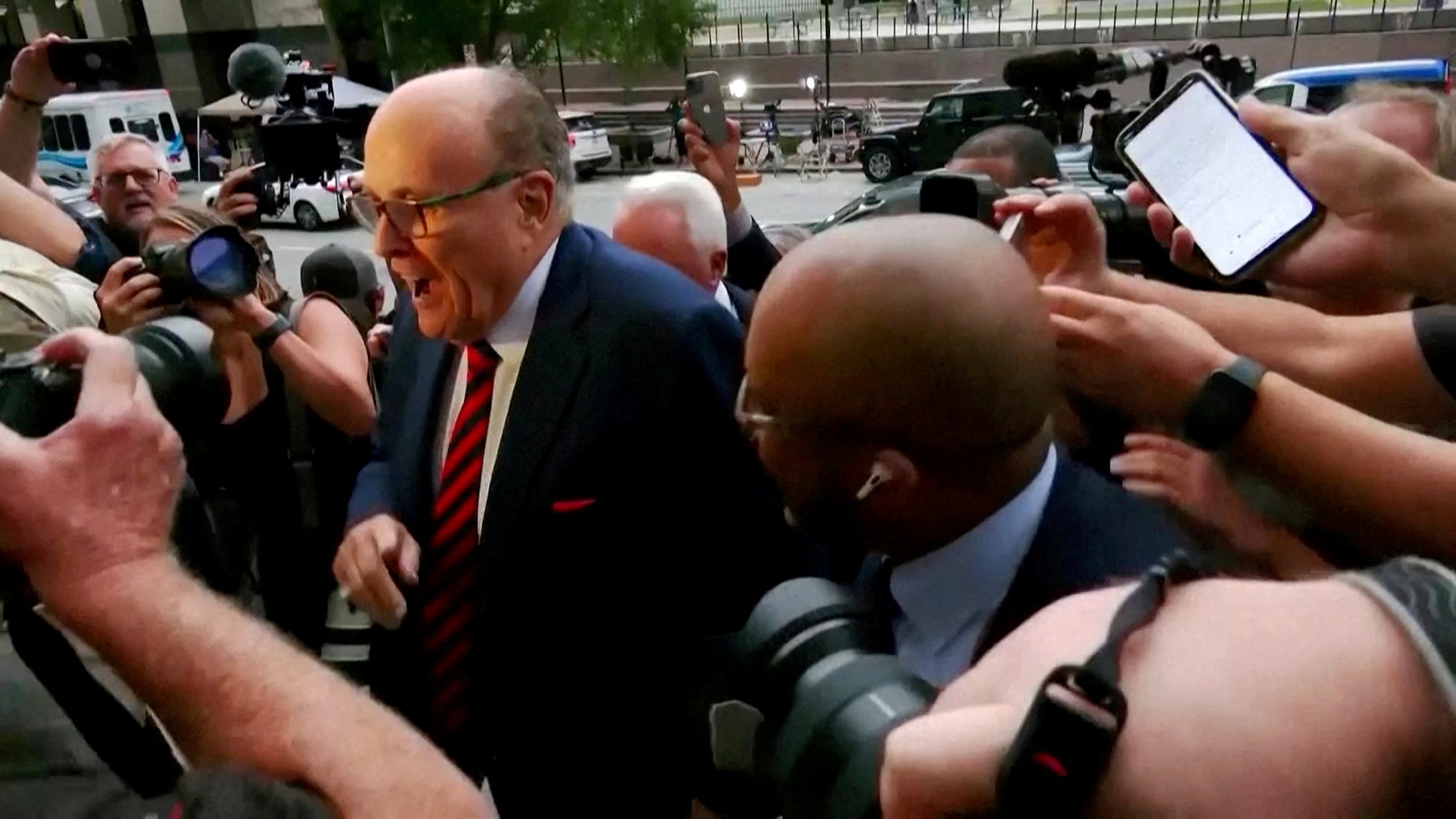 Rudy Giuliani arrives at a courthouse in Atlanta