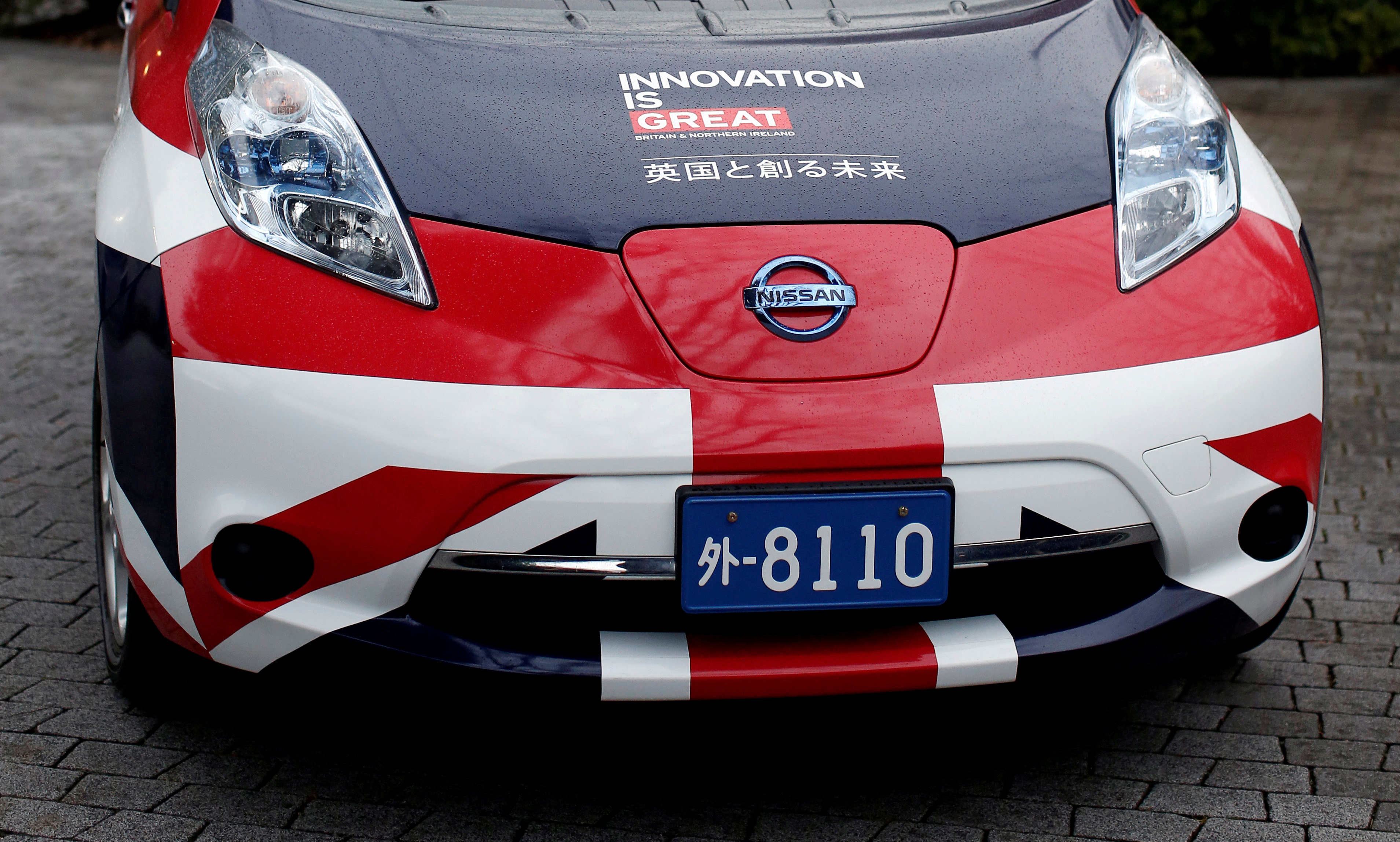 Union Jack painted Nissan Leaf electric vehicle is displayed at the British Embassy in Tokyo