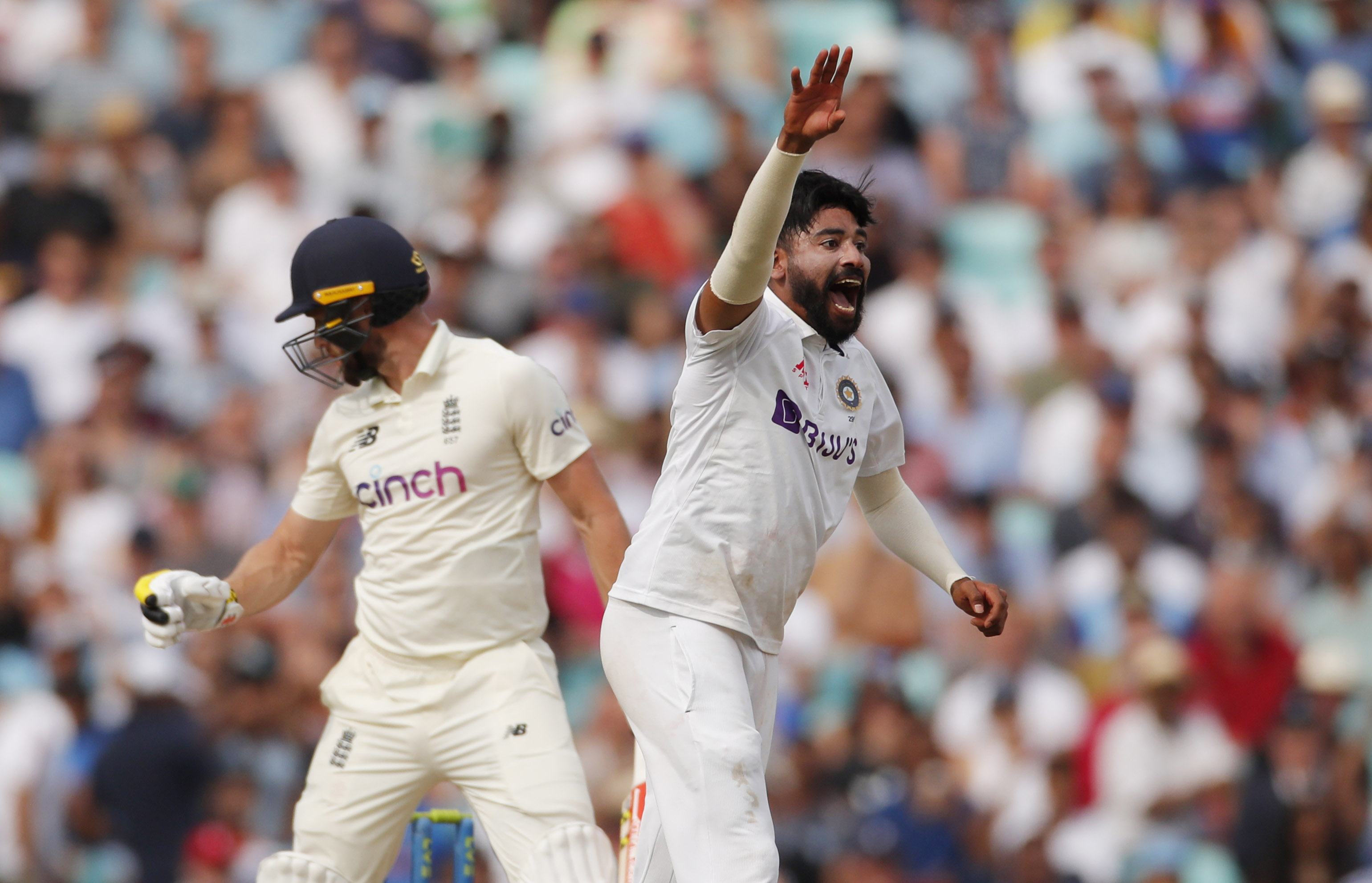 Cricket - Fourth Test - England v India - The Oval, London, Britain - September 6, 2021 India's Mohammed Siraj appeals for the wicket of England's Chris Woakes Action Images via Reuters/Andrew Couldridge/File Photo