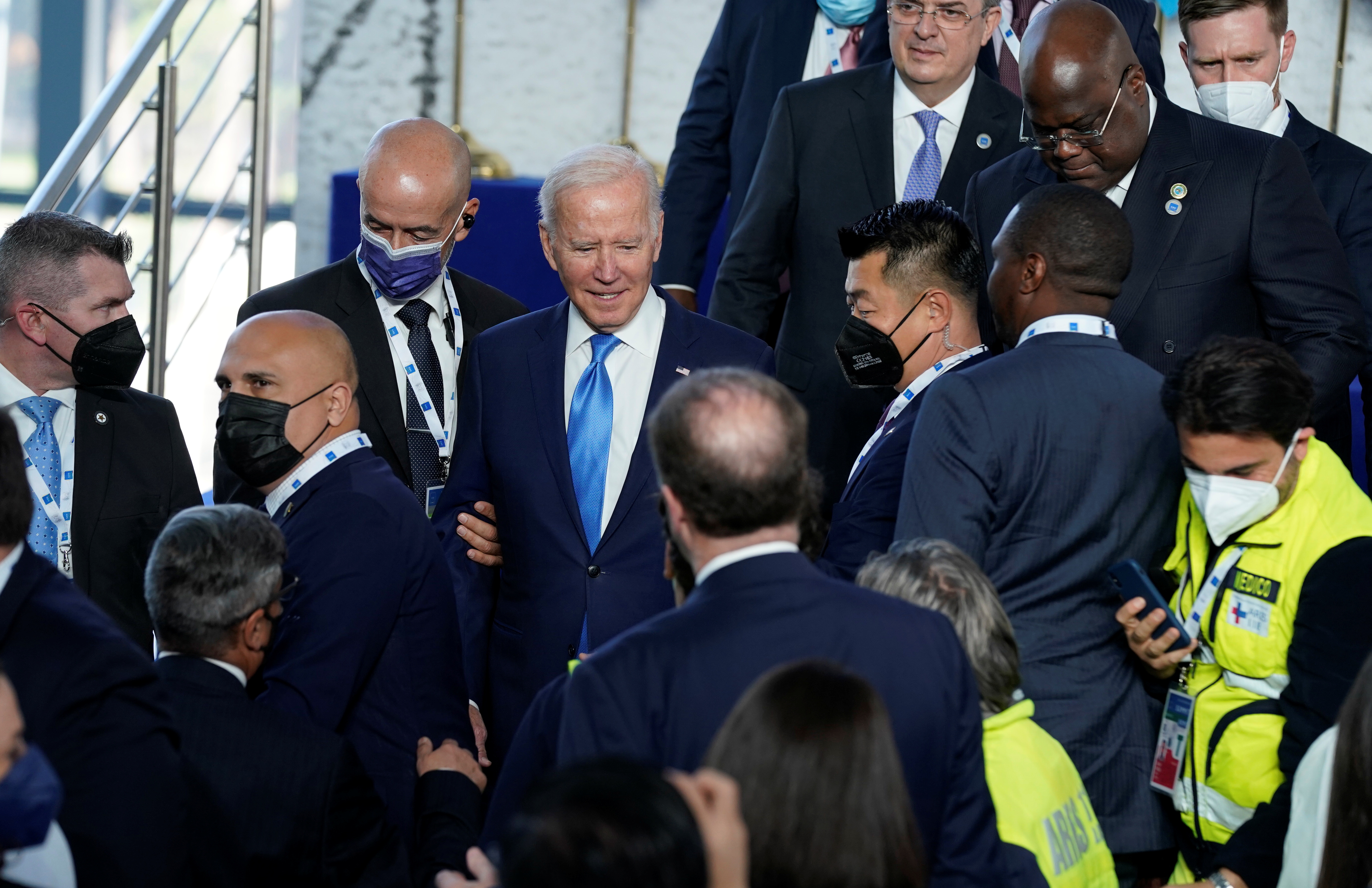 U.S. President Joe Biden prepares to step off the podium after a group photo at the G20 summit in Rome, Italy October 30, 2021. Evan Vucci/Pool via REUTERS