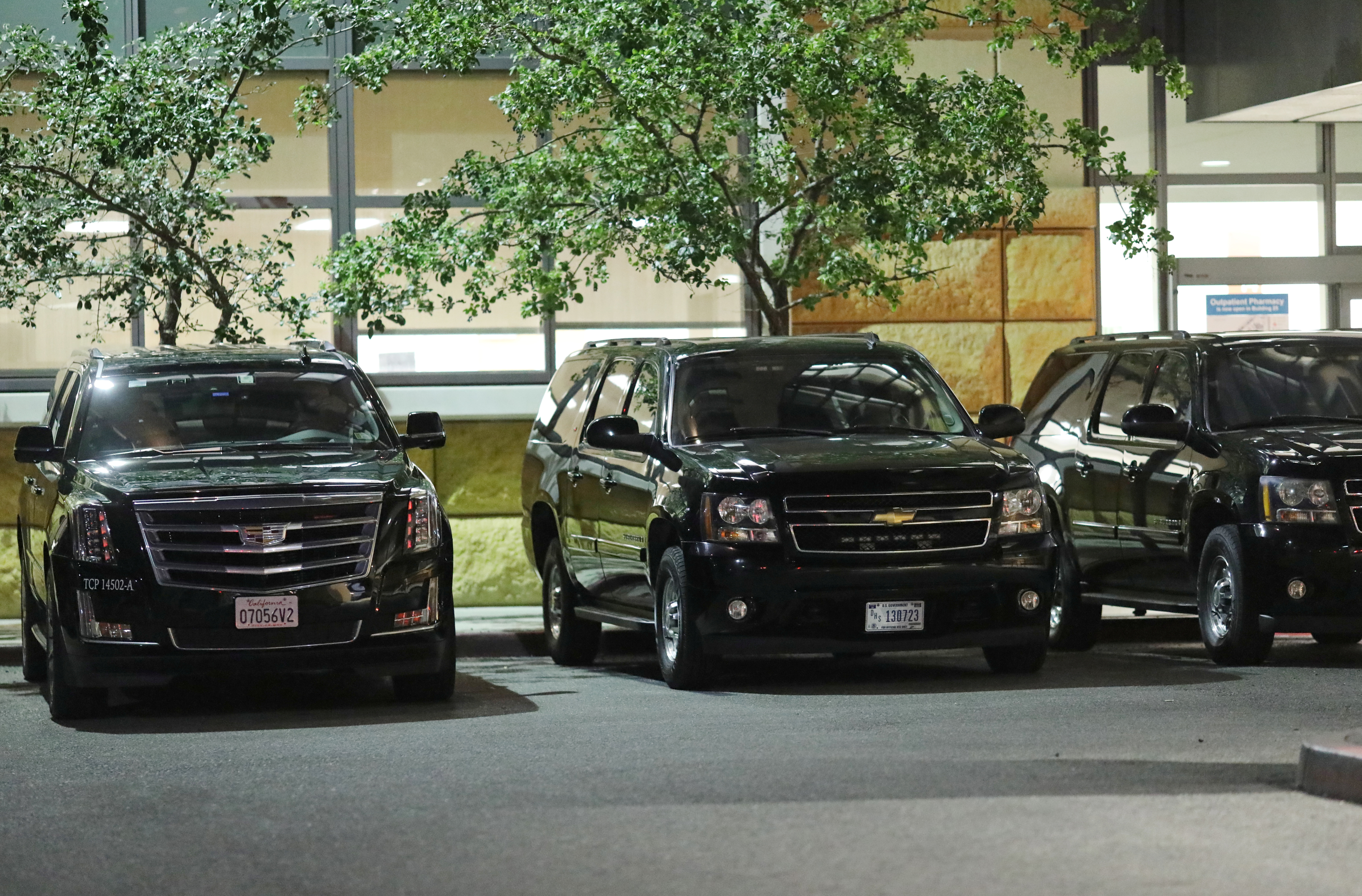 The motorcade of former U.S. President Bill Clinton wait at the University of California Irvine Douglas Hospital, after Clinton was admitted to the UCI Medical Center, in Orange