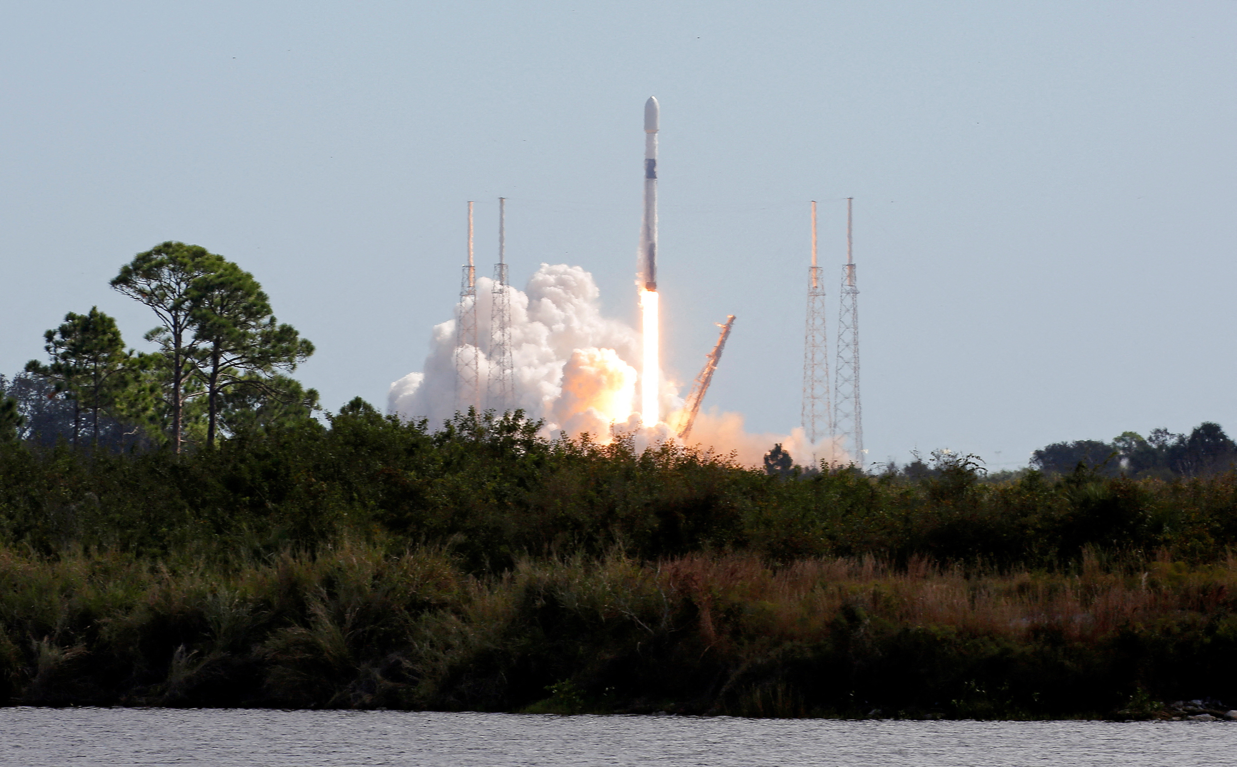 SpaceX launches a Falcon 9 rocket carrying a pair of television broadcasting satellites for Intelsat from launch pad 40