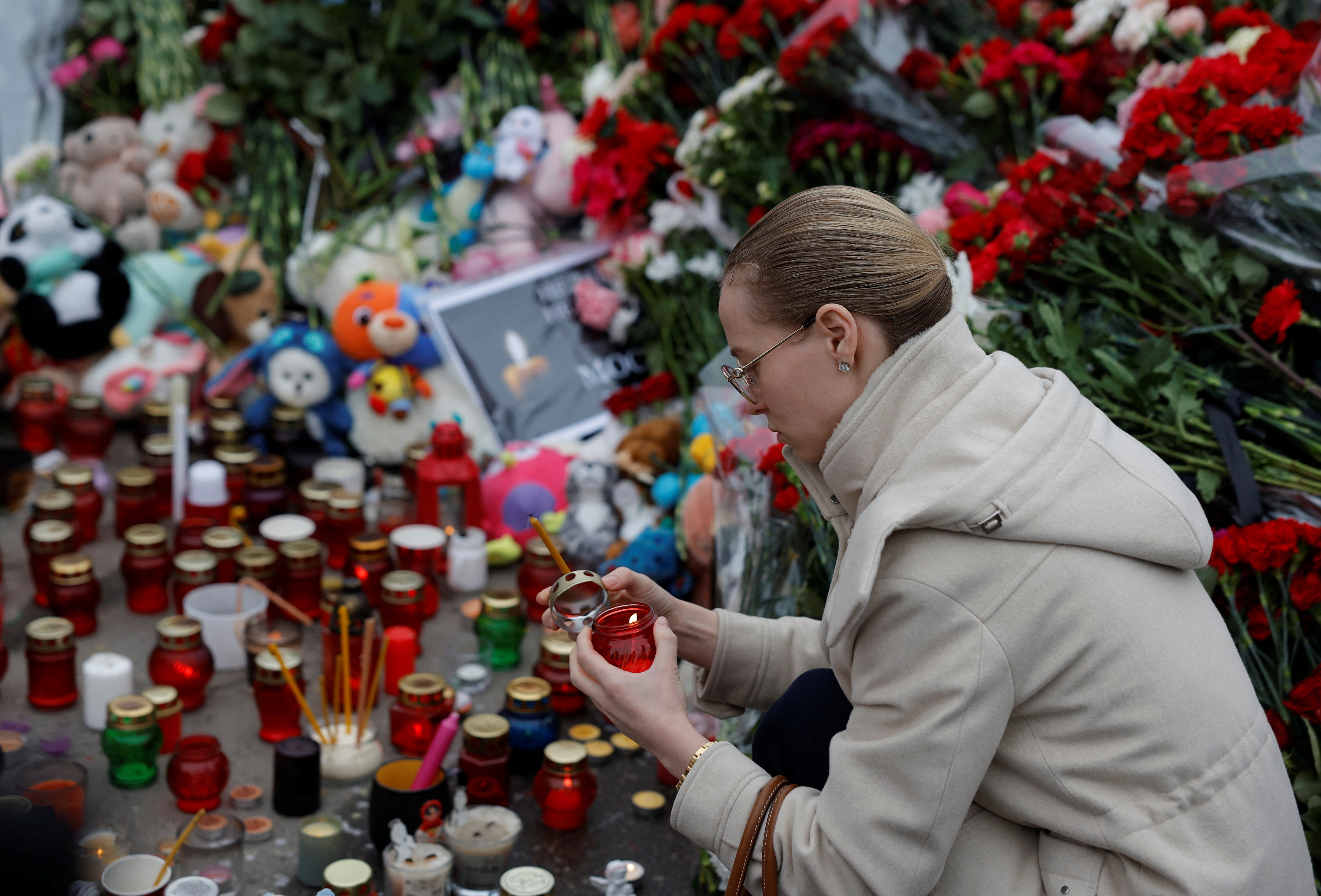 A makeshift memorial to the victims of a shooting attack set up outside the Crocus City Hall concert venue in the Moscow Region