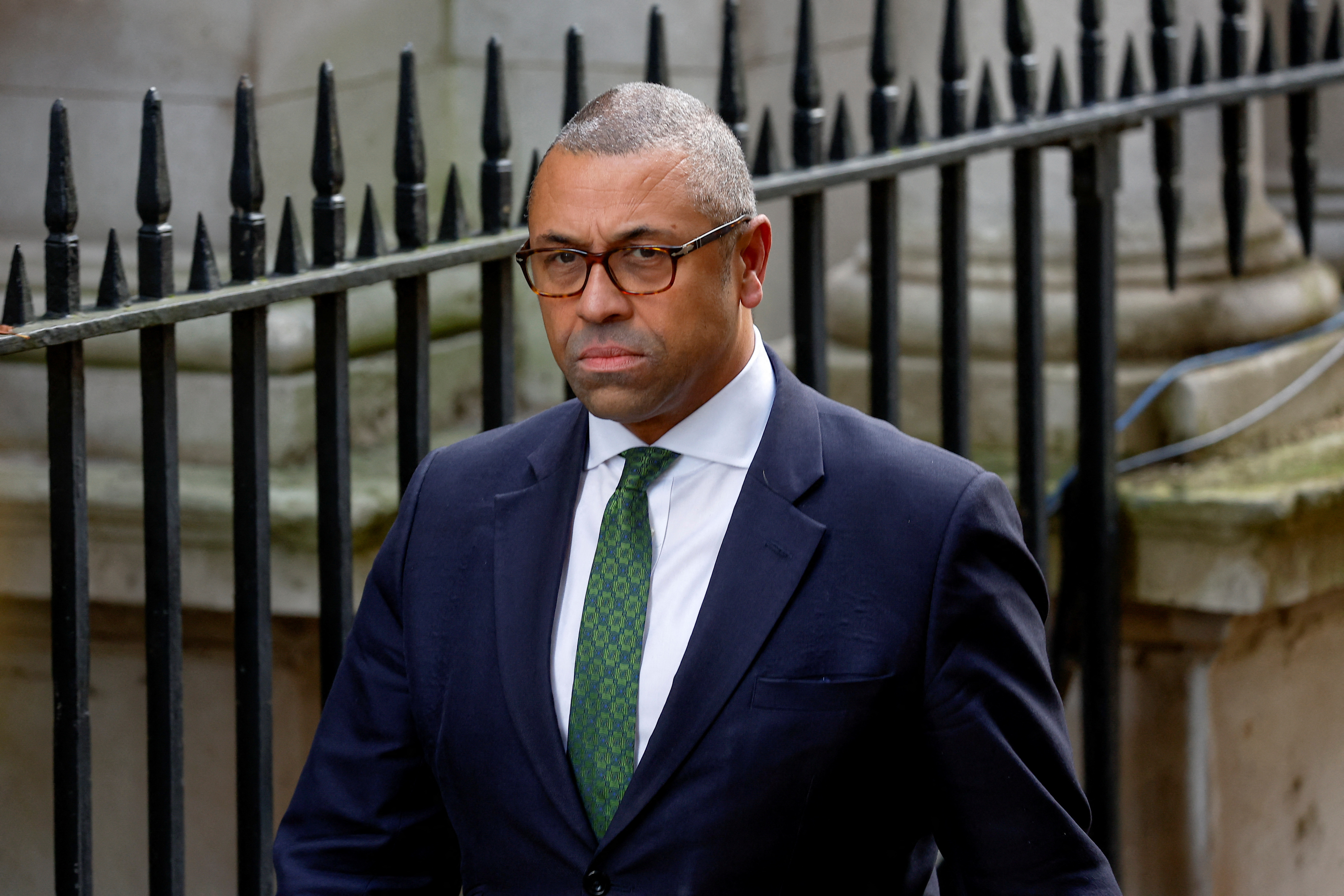 James Cleverly walks outside Number 10 Downing Street in London