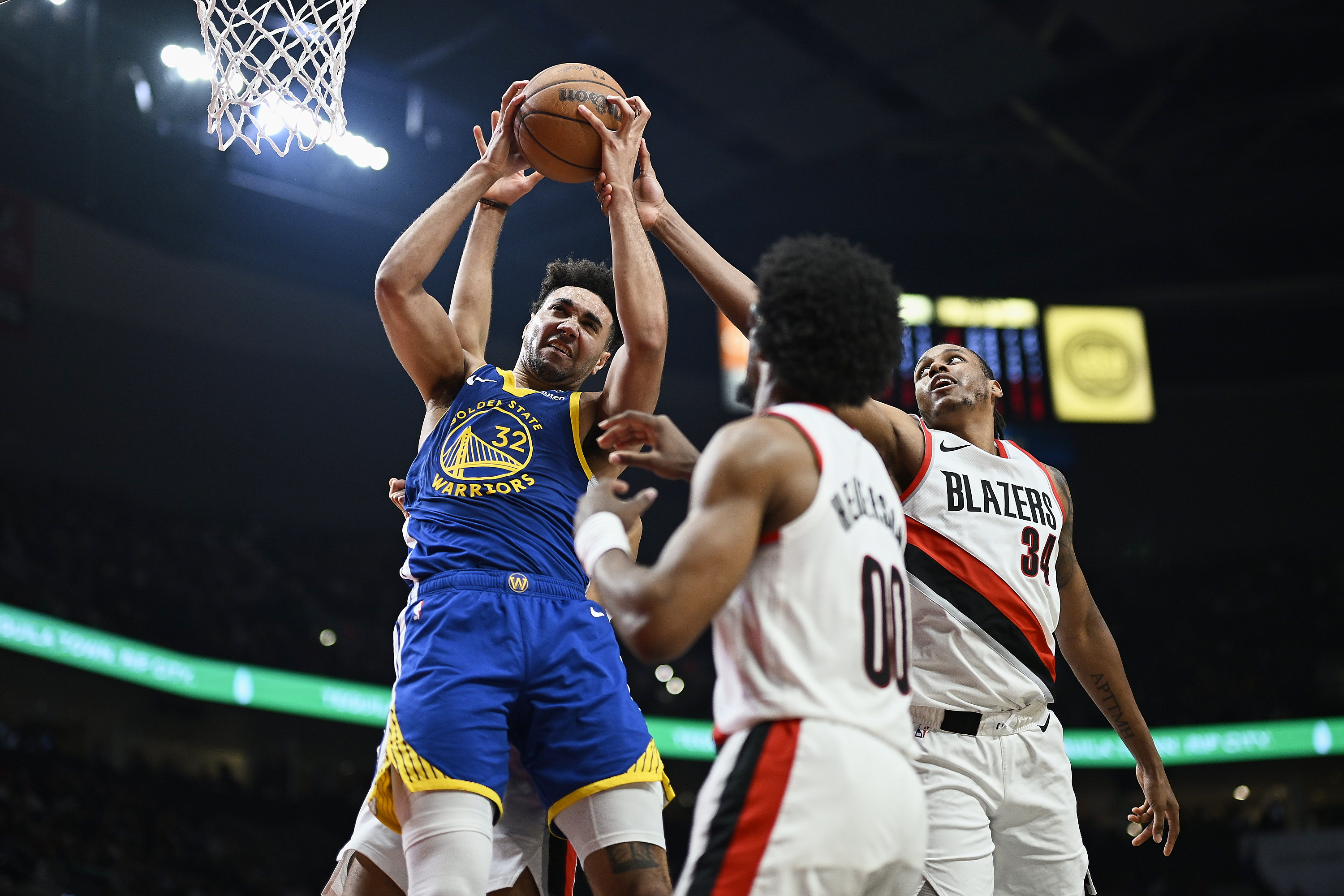 Warriors beat Blazers, forge 3-way tie for 8th in West | Reuters