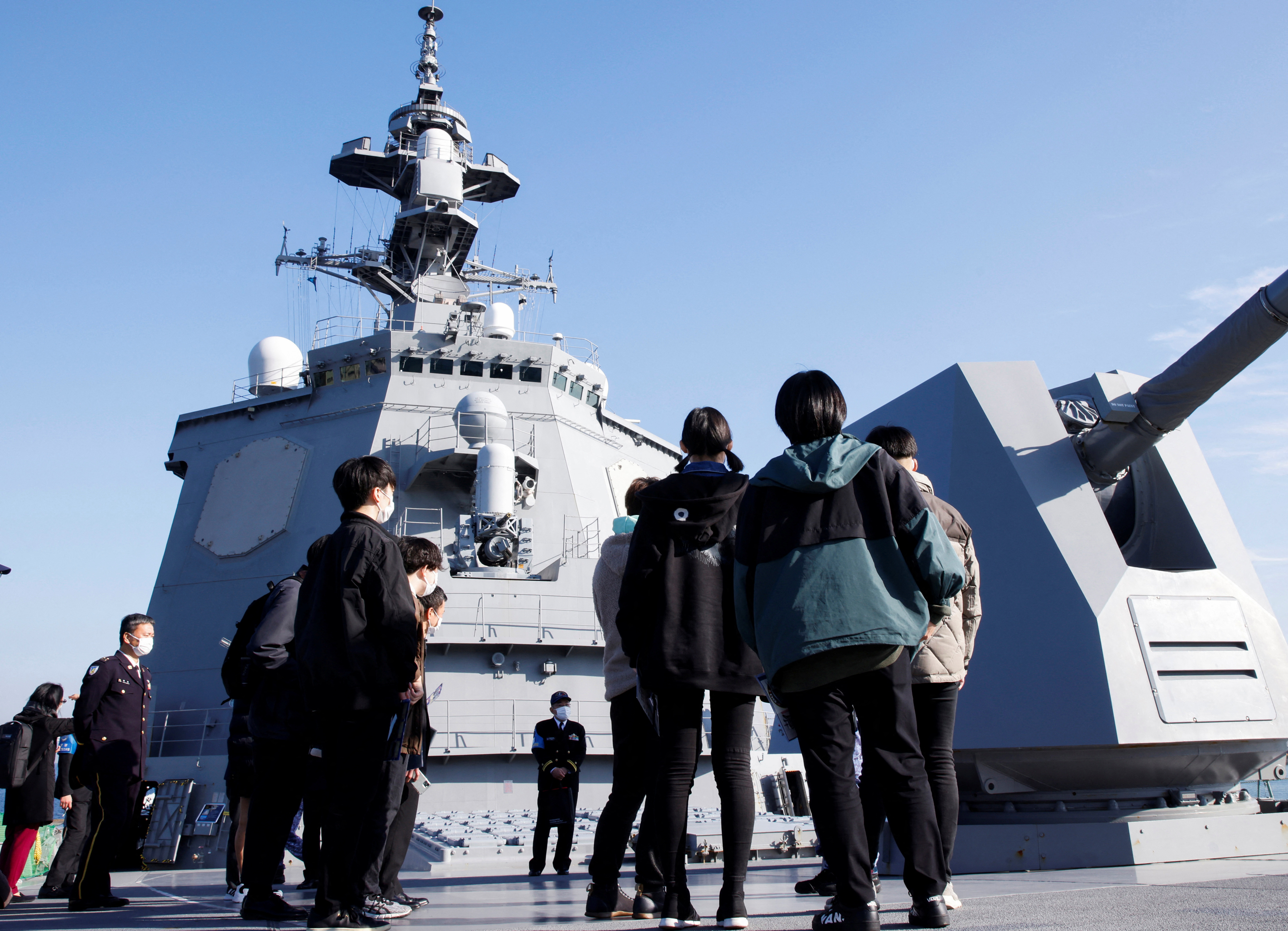 Participants look around Japan's Maritime Self-Defense Force's vessel at a recruiting event in Yokosuka