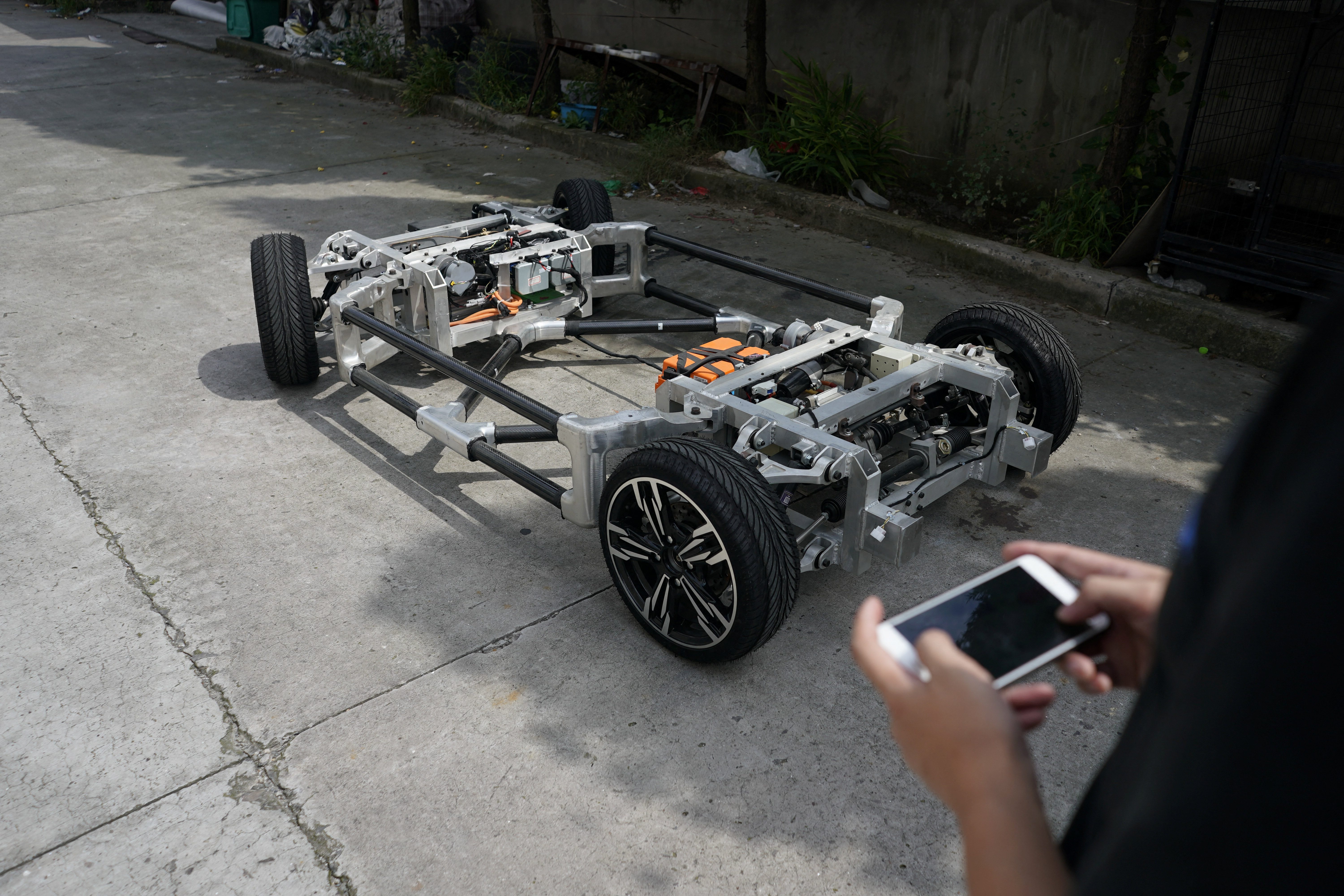 Electric car is seen in a workshop of Automagic in Hangzhou