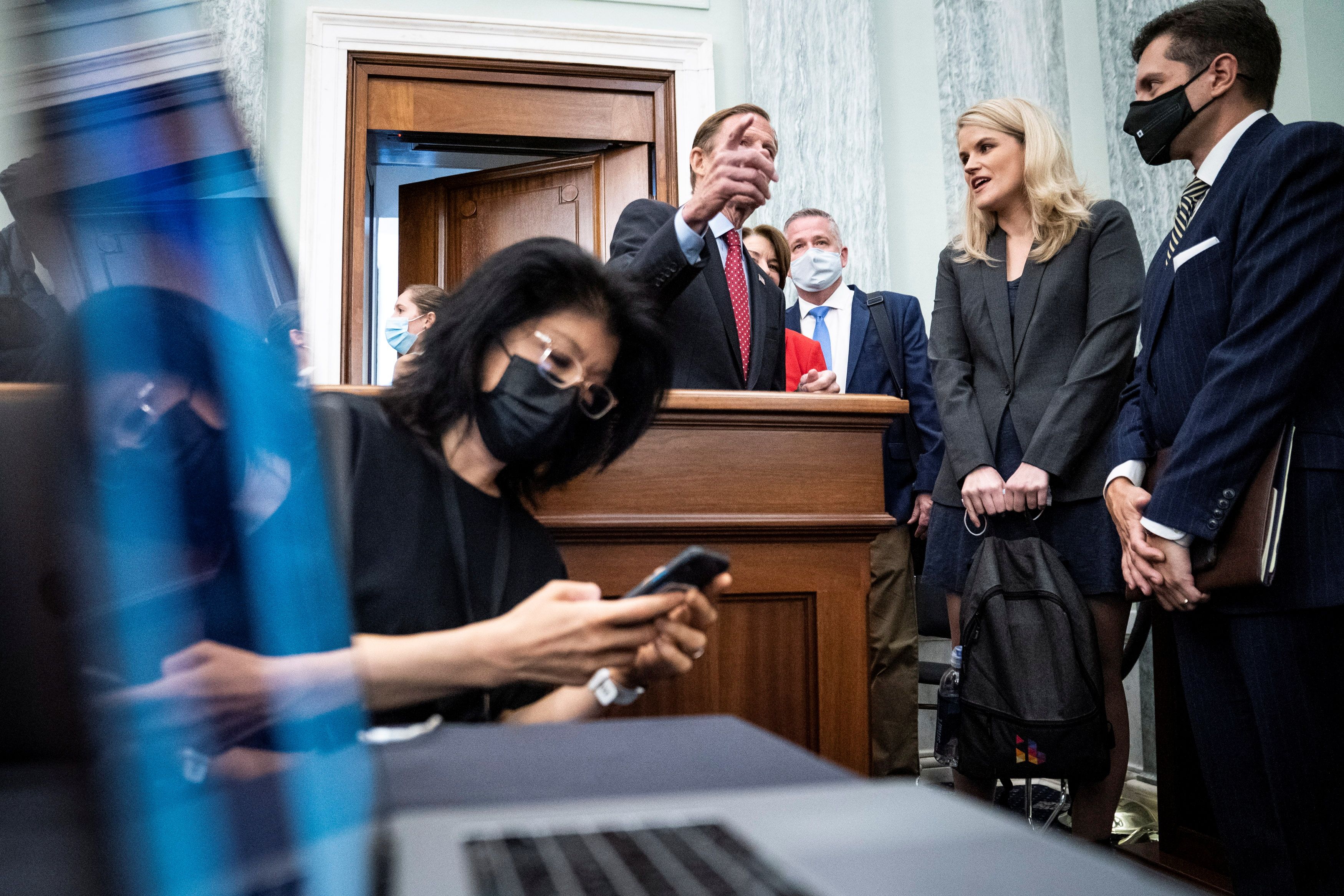 Former Facebook employee and whistleblower Frances Haugen speaks with Sen. Richard Blumenthal (D-CT) during a Senate Committee on Commerce, Science, and Transportation hearing entitled 'Protecting Kids Online: Testimony from a Facebook Whistleblower' on Capitol Hill, in Washington, U.S., October 5, 2021.  Jabin Botsford/Pool via REUTERS