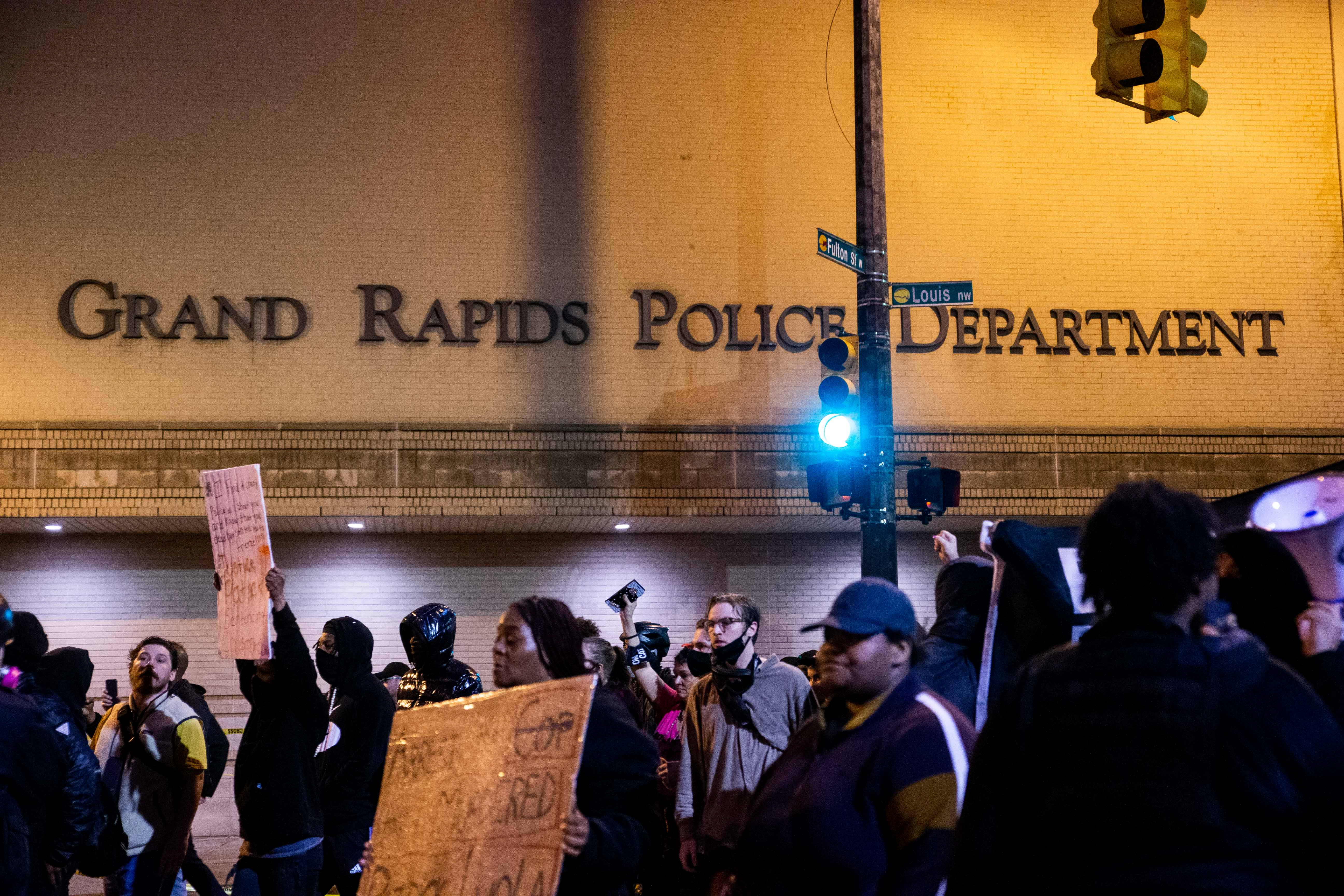 Protesters march around the block surrounding the Grand Rapids Police Department in response to the killing of Patrick Lyoya