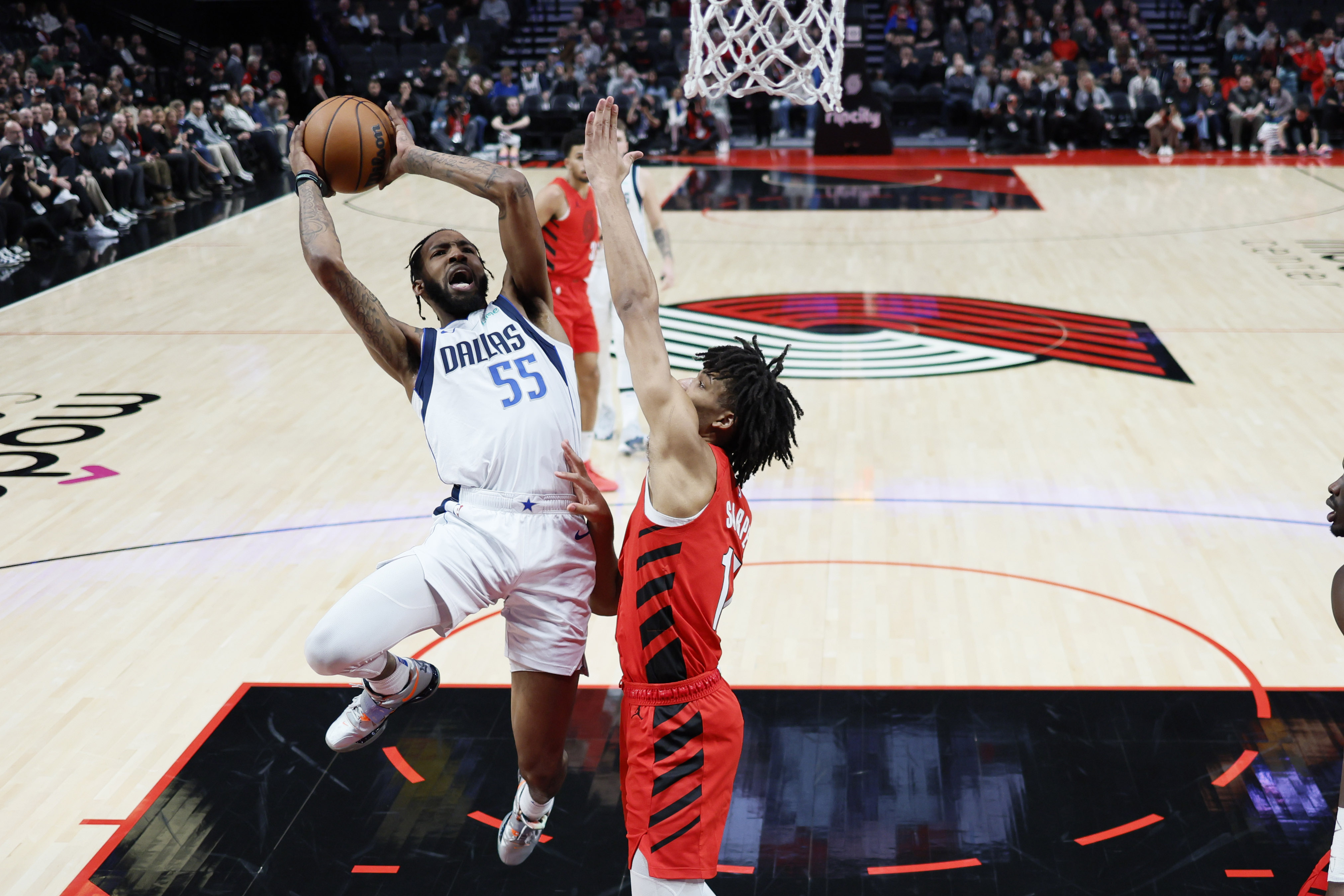 Kyrie Irving Injured In Mavericks' Victory Over Blazers | Reuters