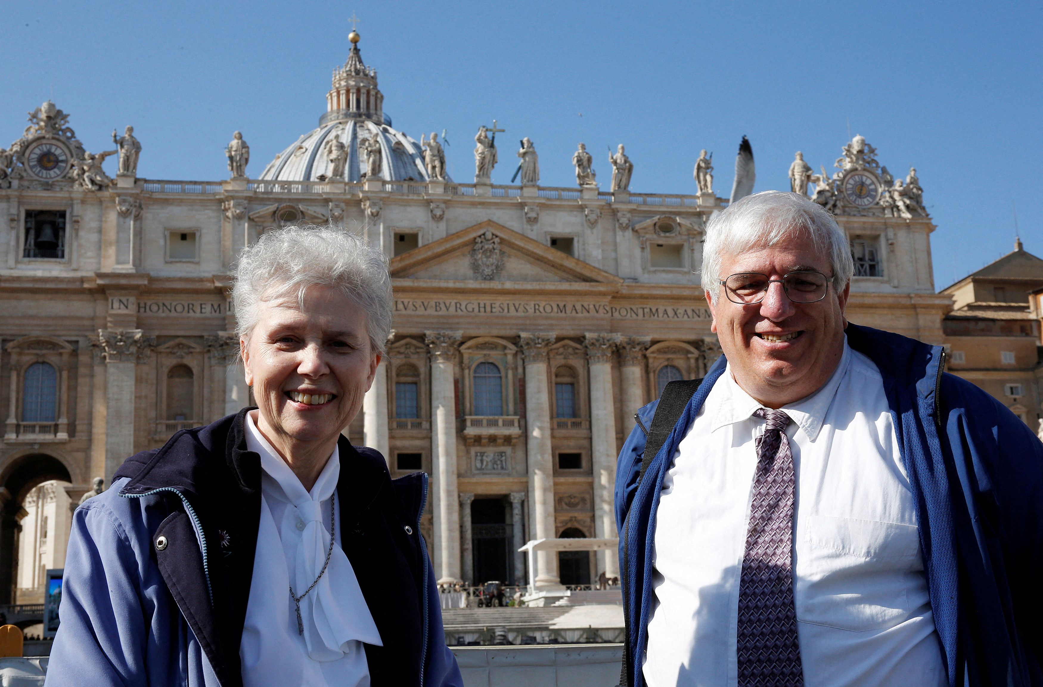 Jeannine Gramick and Francis DeBernardo pose in front of St. Peter's Square