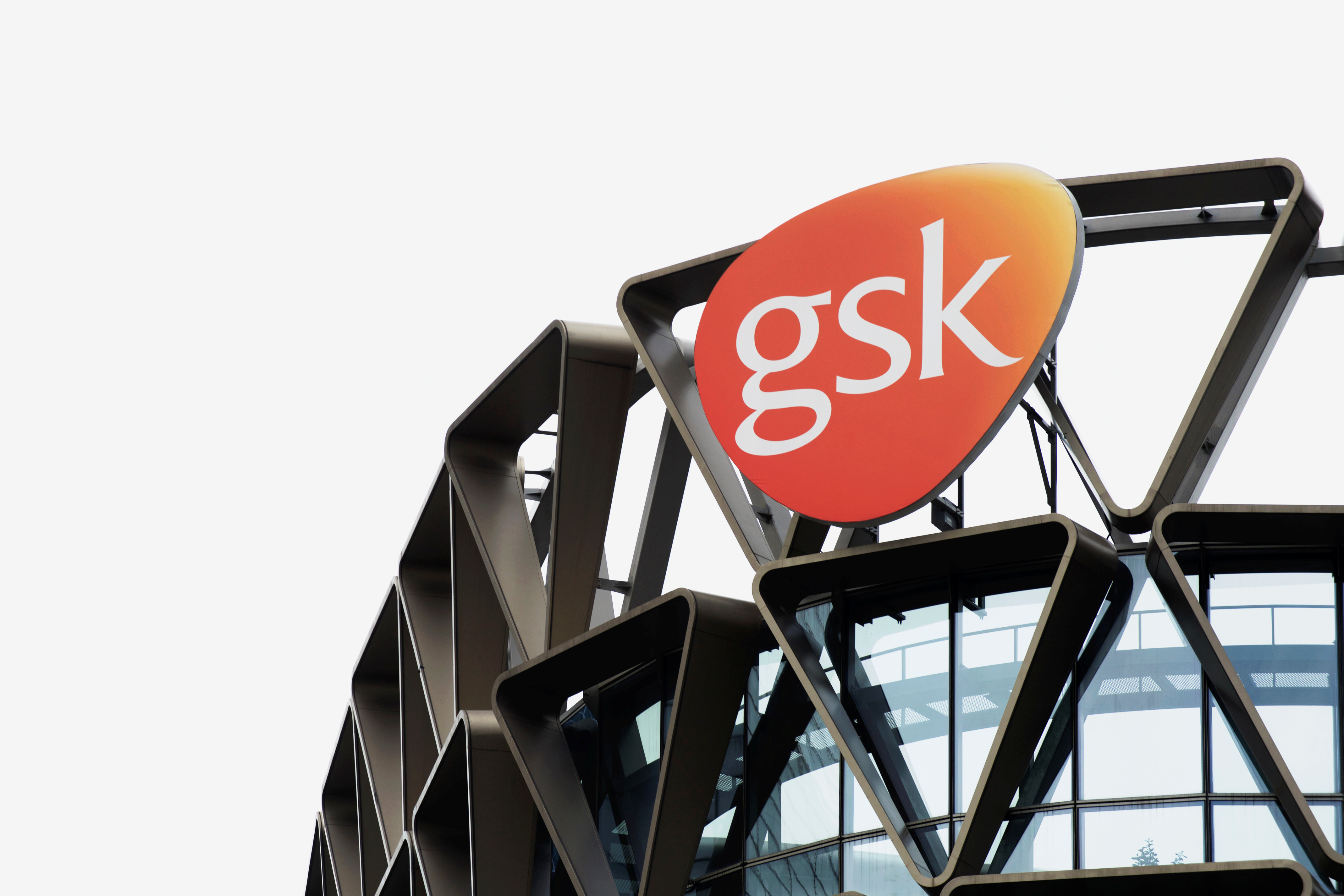 The GSK logo is seen on top of GSK Asia House in Singapore