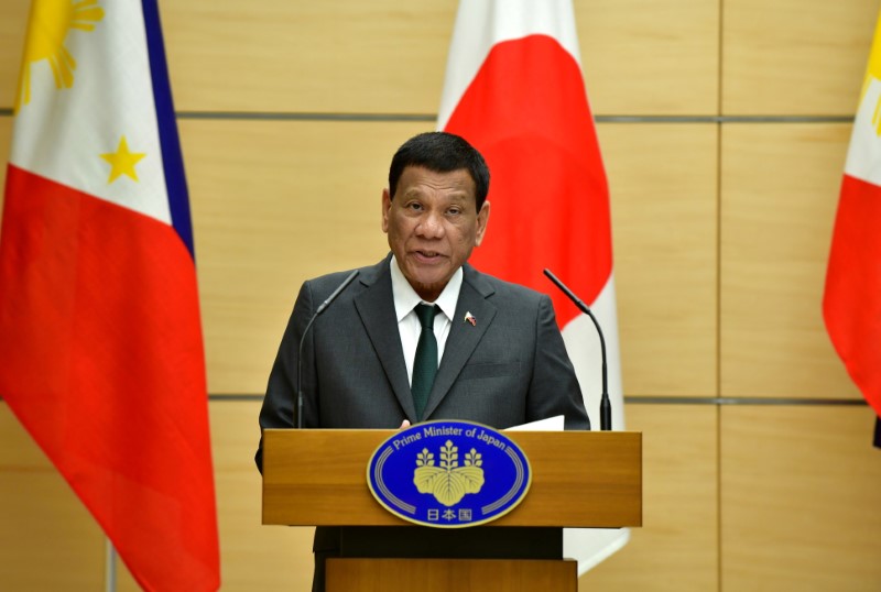 Philippine President Rodrigo Duterte delivers a speech during their joint press statement with Japan's Prime Minister Shinzo Abe in Tokyo