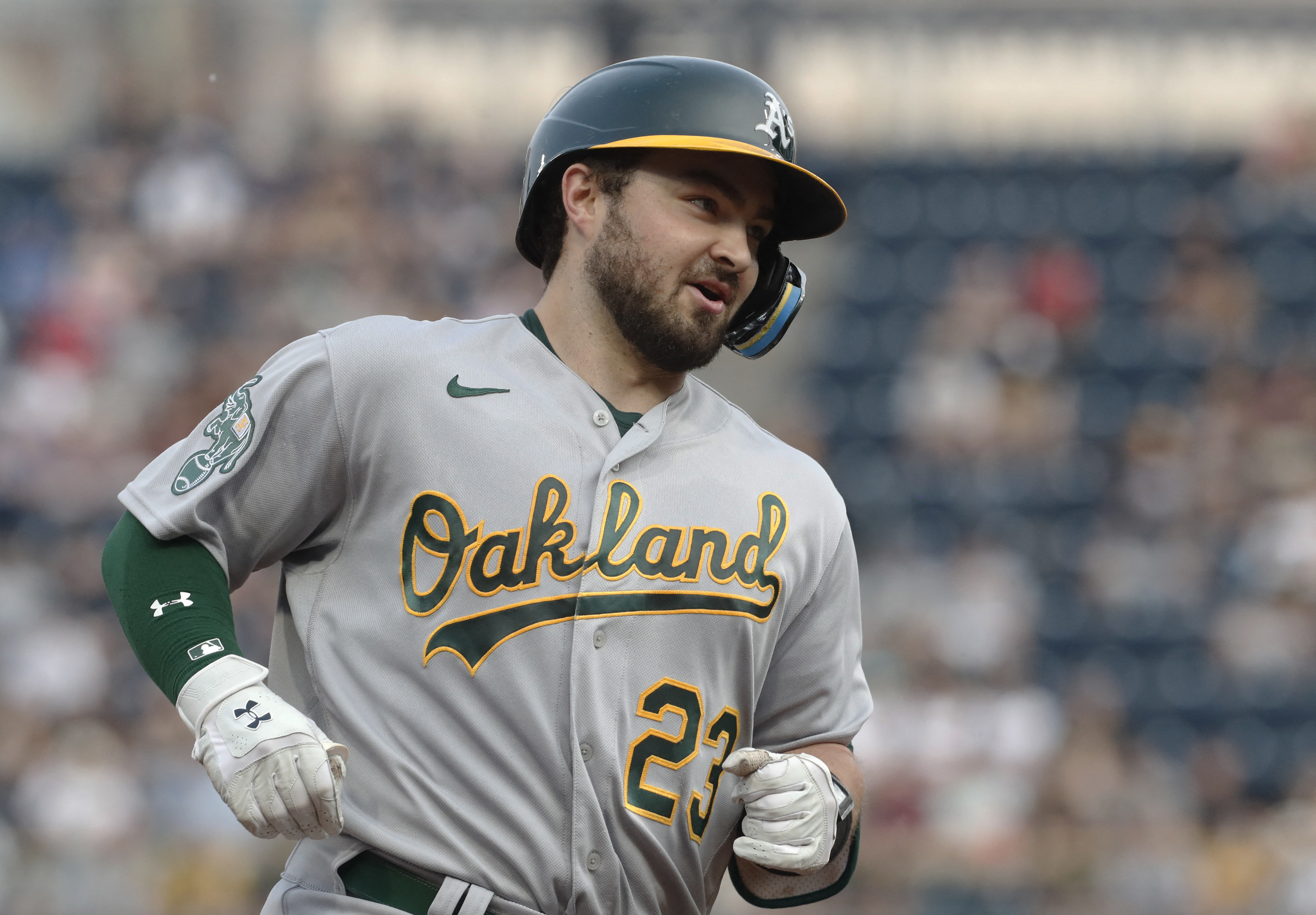 A's sock four homers, batter Pirates to end skid